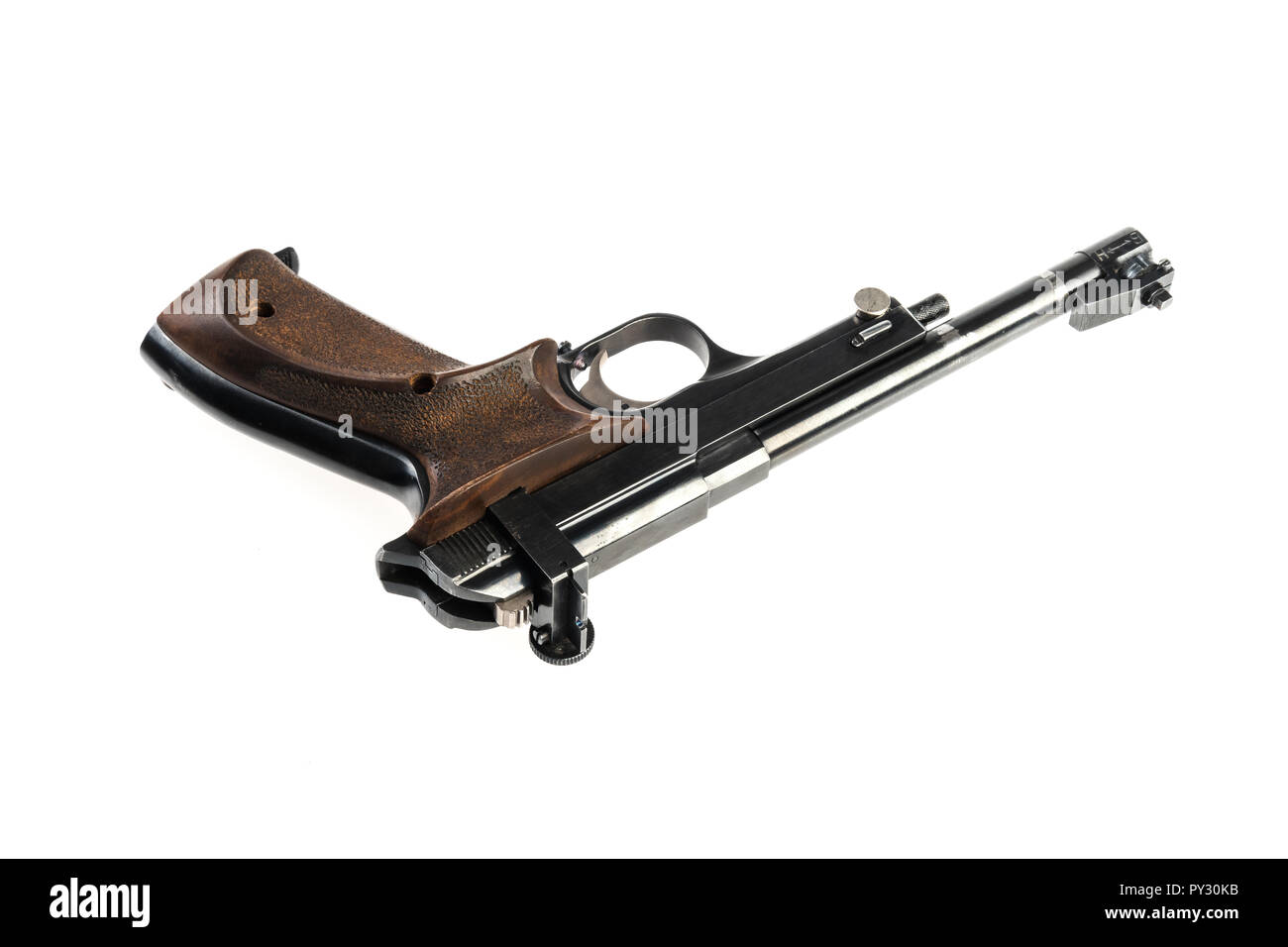 isolated used old sports pistol on a white background Stock Photo - Alamy