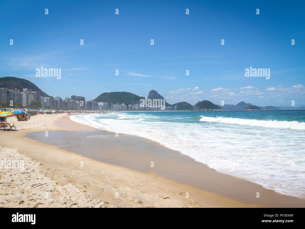 Copacabana Beach with Sugar Loaf Mountain on Background - Rio de Janeiro, Brazil Stock Photo