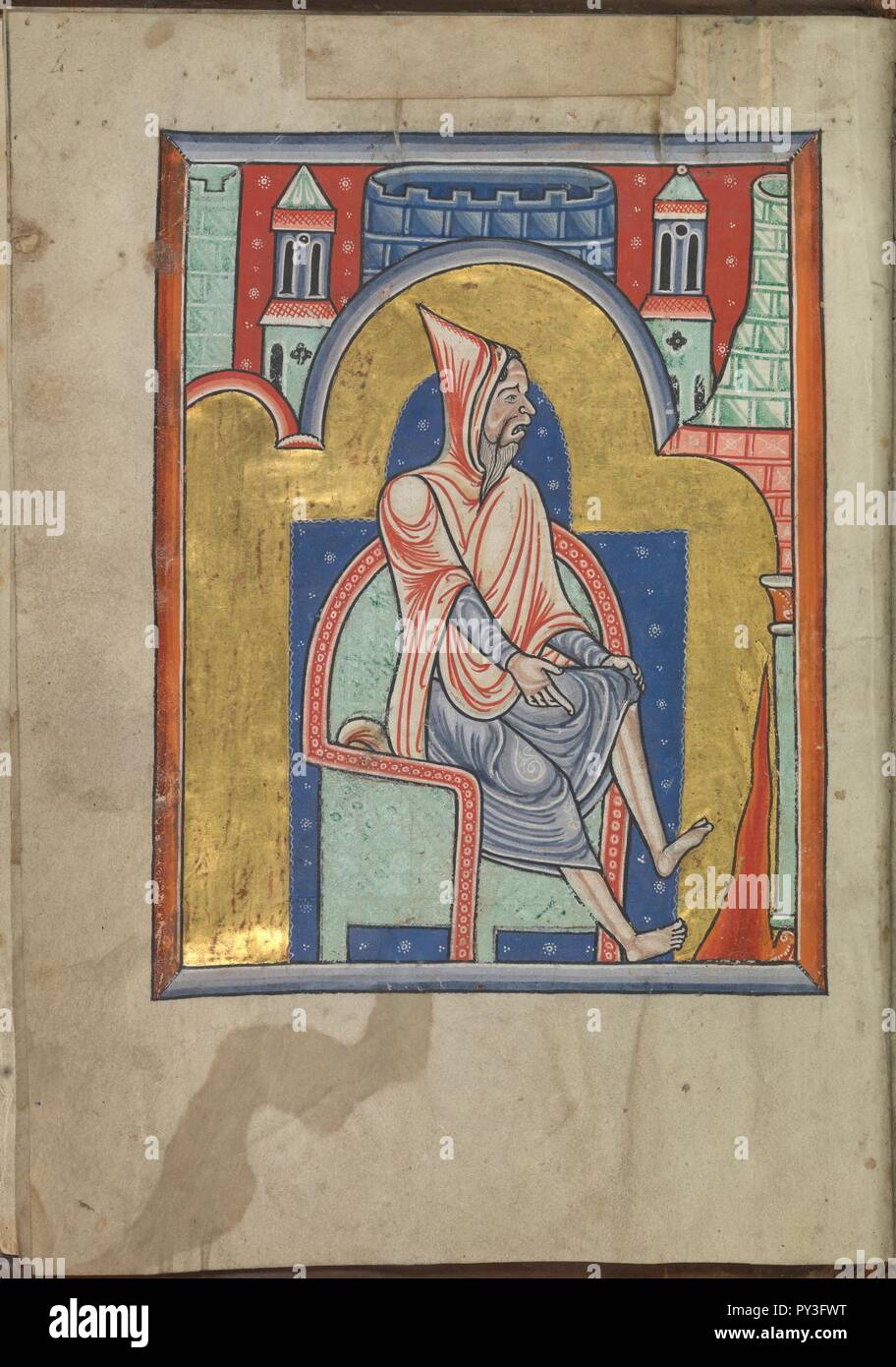 Calendar, February, a man warming his feet at a fire - Psalter of Eleanor of Aquitaine (ca. 1185) - KB 76 F 13, folium 002v. Stock Photo