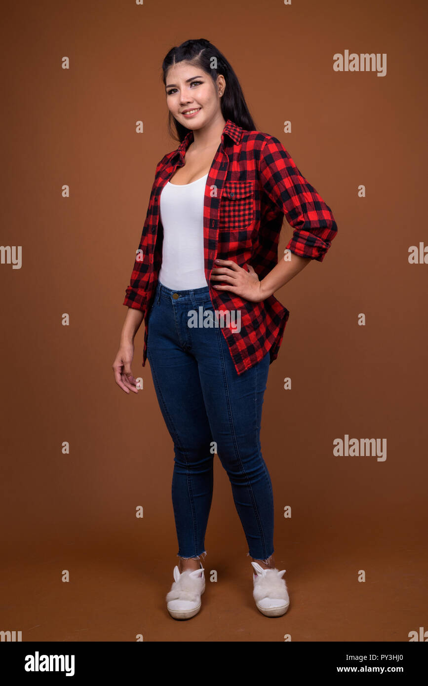 Studio portrait of young beautiful Asian woman Stock Photo - Alamy