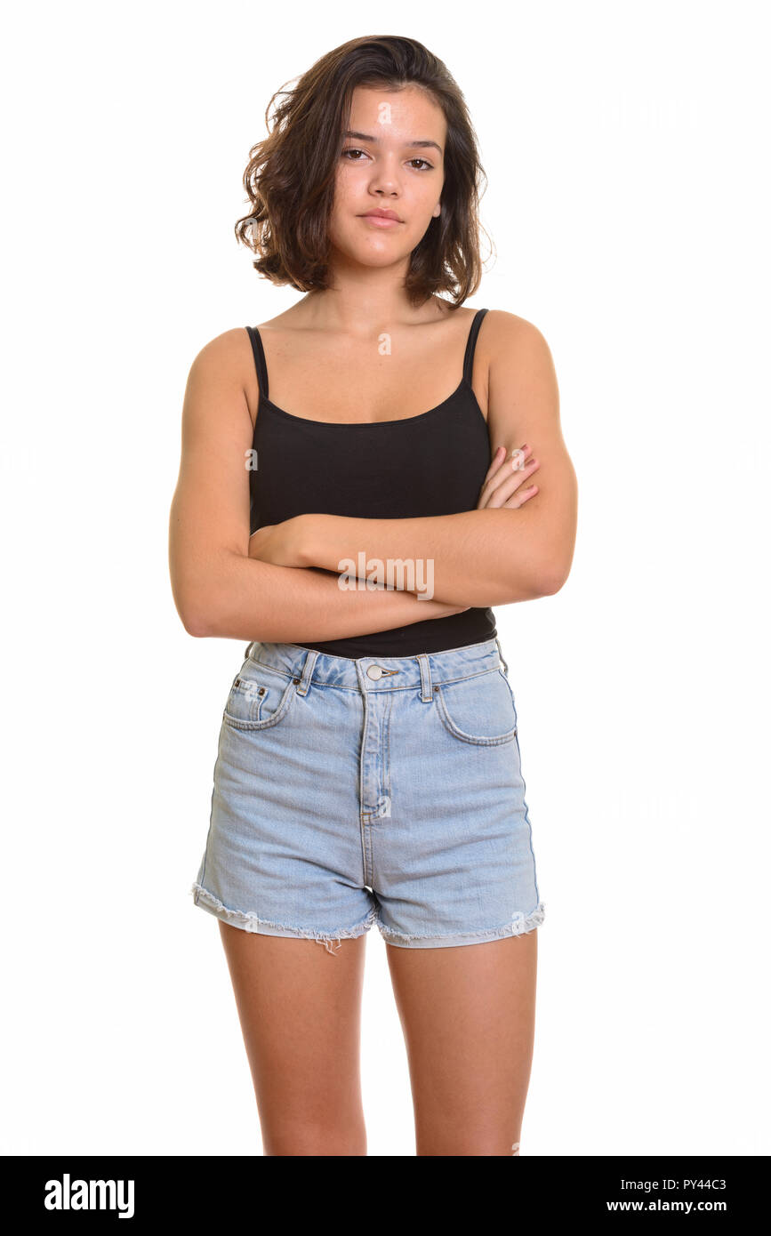 Portrait of young beautiful Caucasian teenage girl with arms crossed Stock Photo