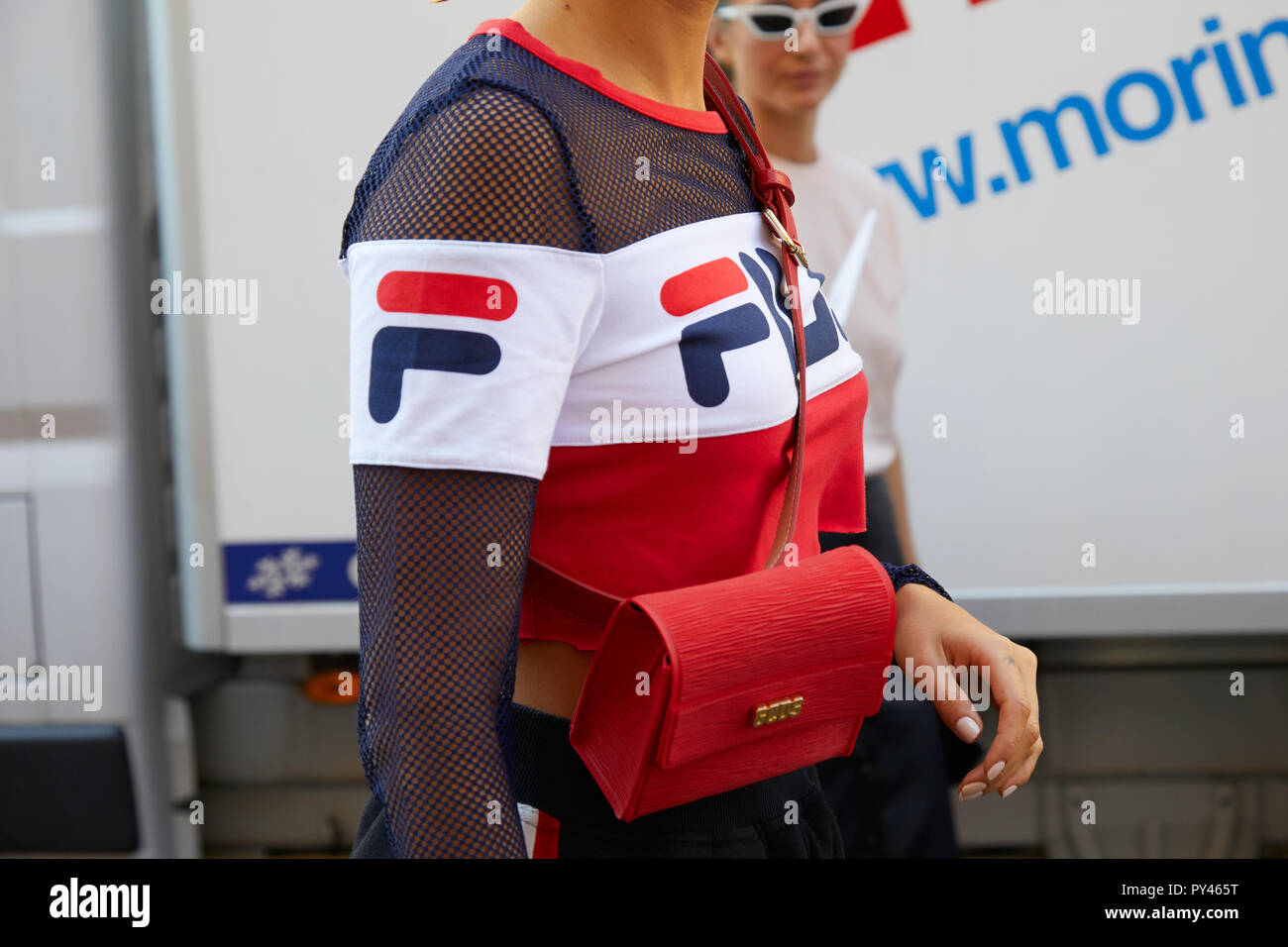 red and blue fila shirt