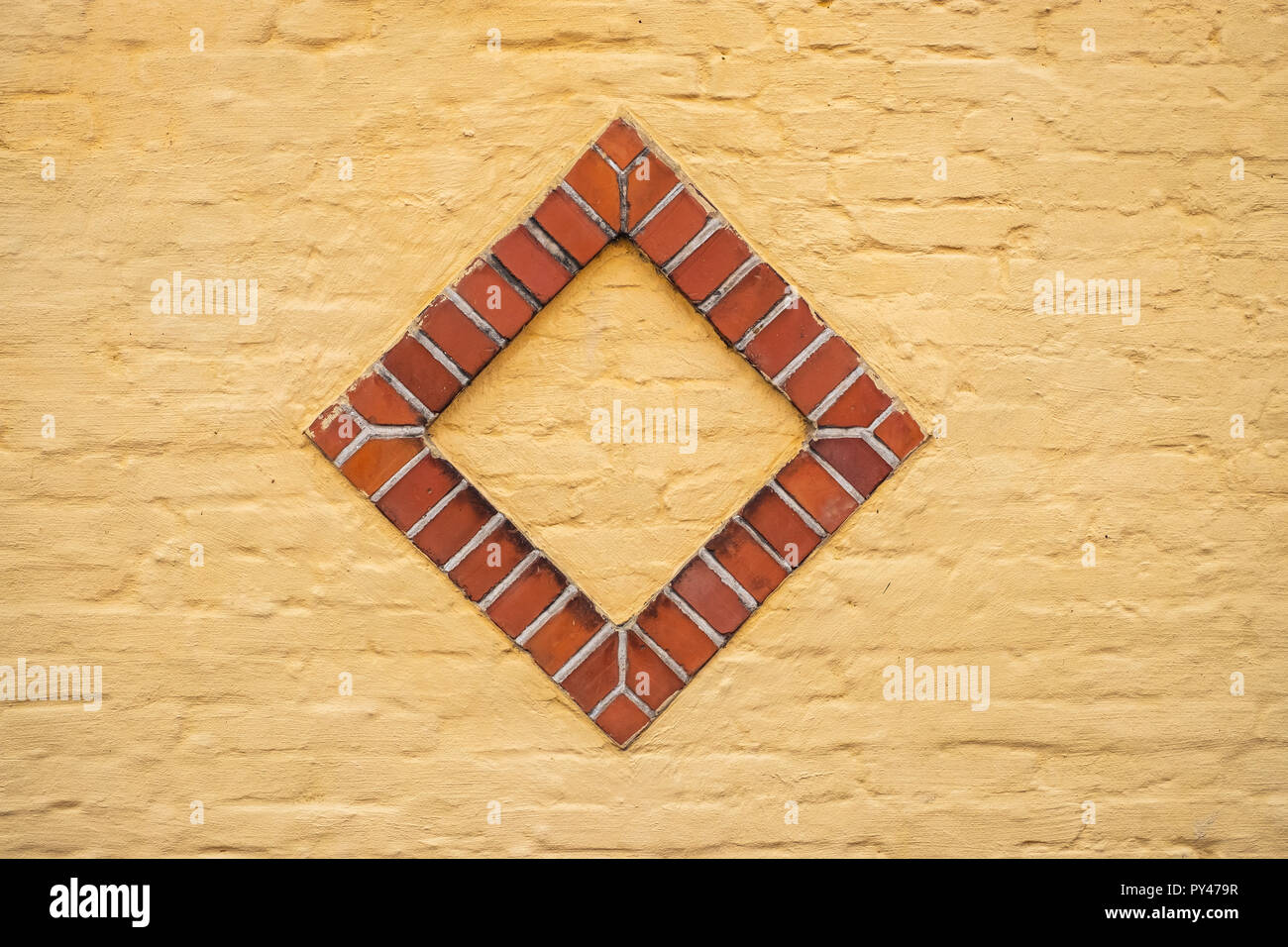 Square pattern in a brick wall. Stock Photo