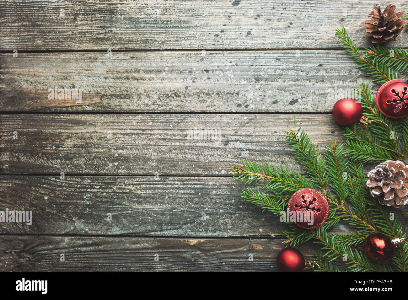 Christmas wooden background with fir tree and decorations. Top view ...