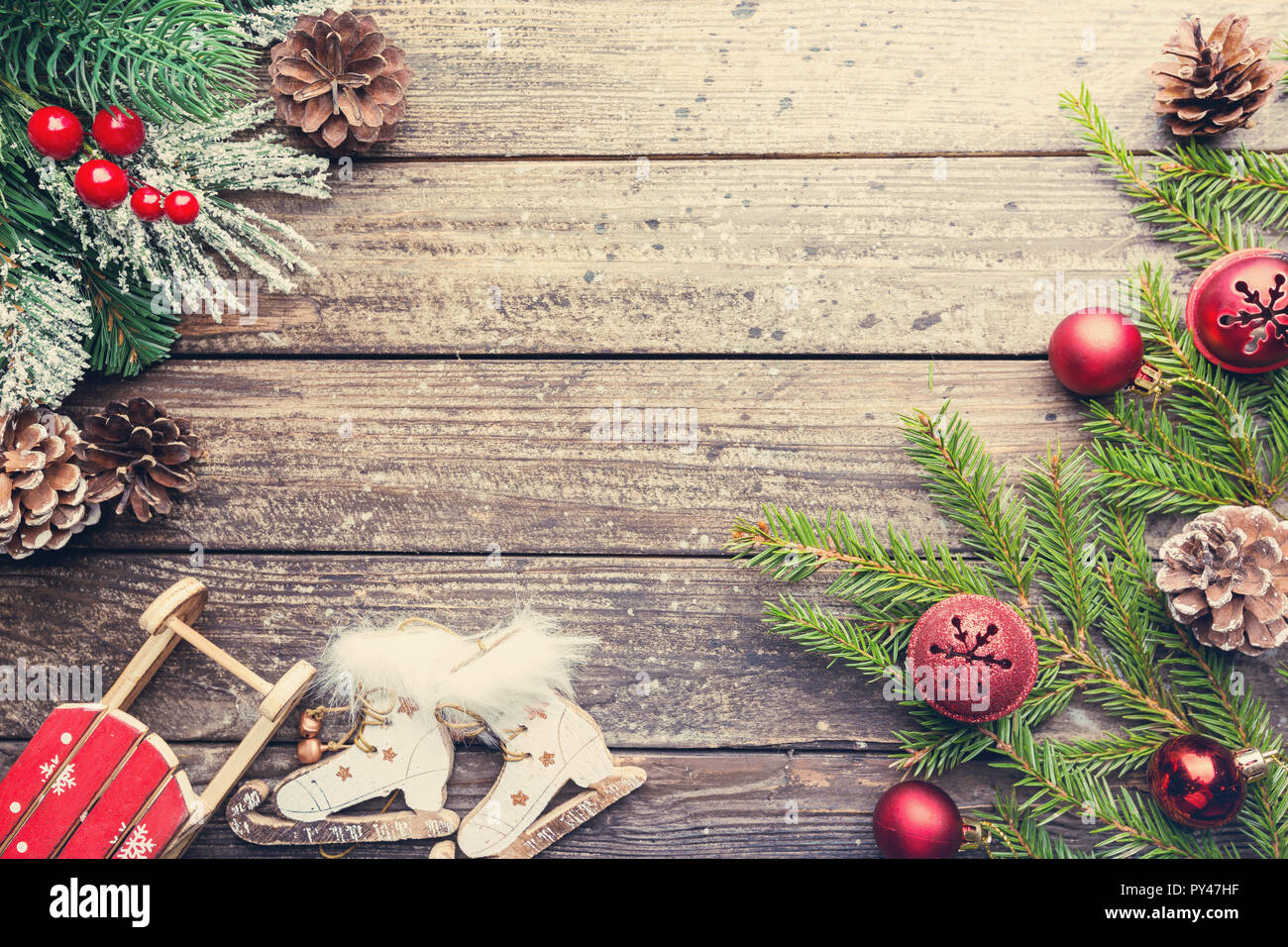Christmas wooden background with fir tree and decorations. Top view ...