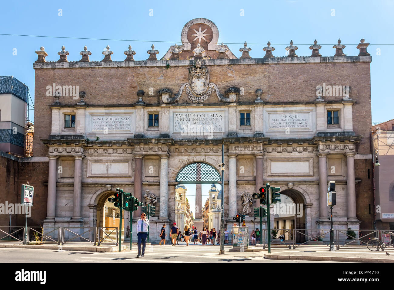 Rome/Italy - 28 August, 2018: Porta del Popolo, a gate of the Aurelian Walls near the Square Stock Photo