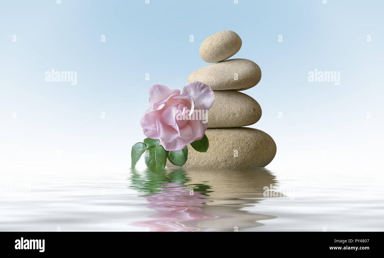 Stone pyramid mut pink rose Stock Photo - Alamy