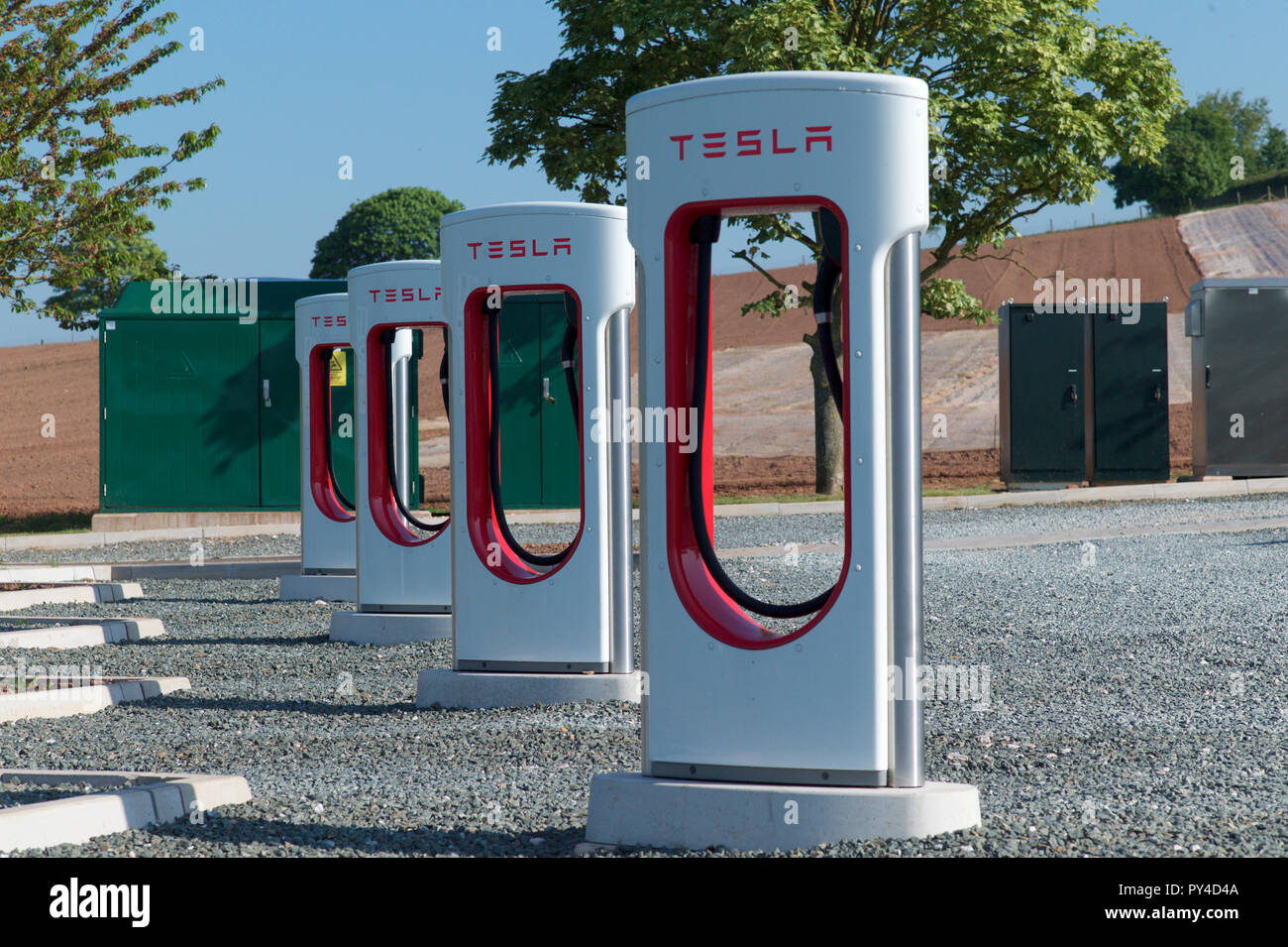 Supercharger station charging tesla electric hires stock photography
