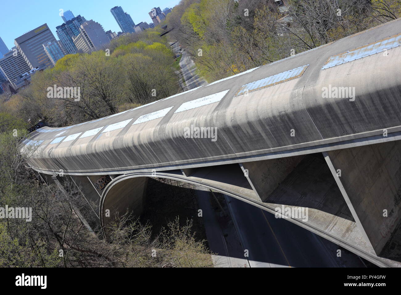 shot of bridge on Bloor street East with a part of the Toronto skyline in the background. Toronto, Ontario, Canada. Stock Photo