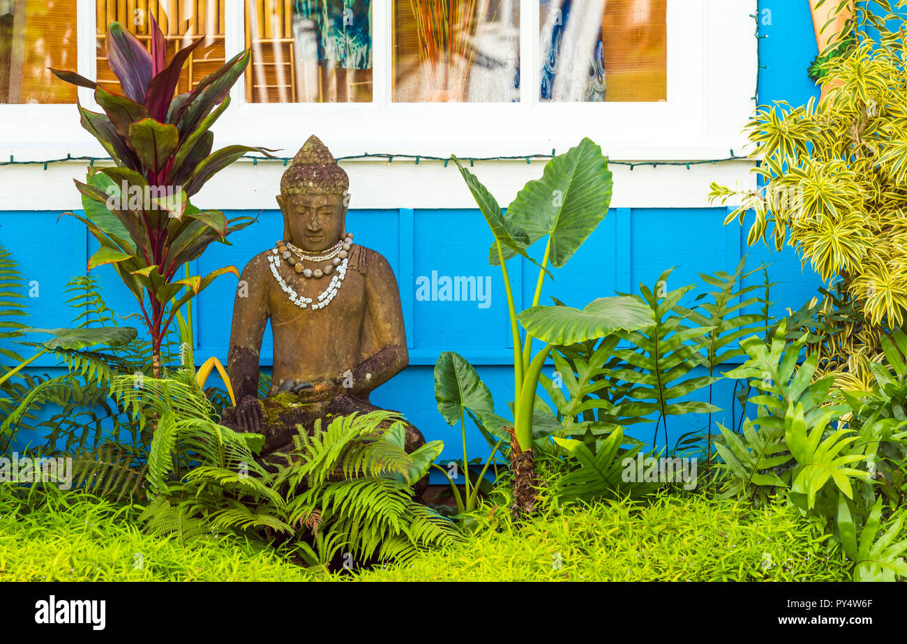 Wooden statue in the garden, Kauai, Hawaii, USA Stock Photo Alamy