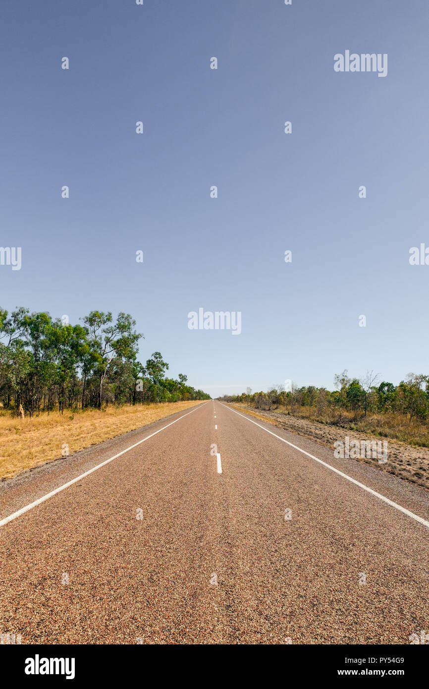 Vertical Image of an Arrow Straight Road in Outback Queensland, Australia Stock Photo