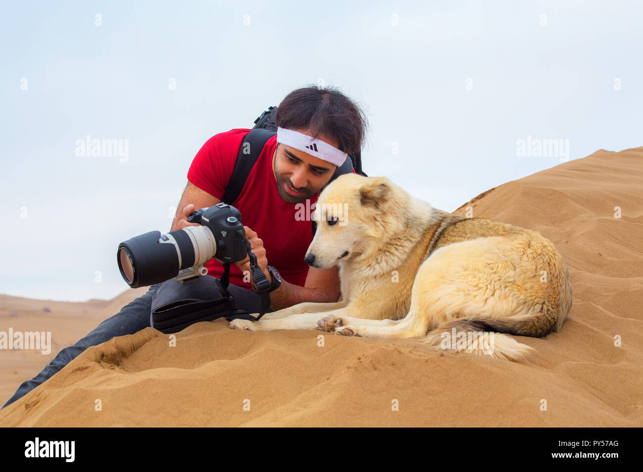 Funny Shot of Photographer and Dog Stock Photo
