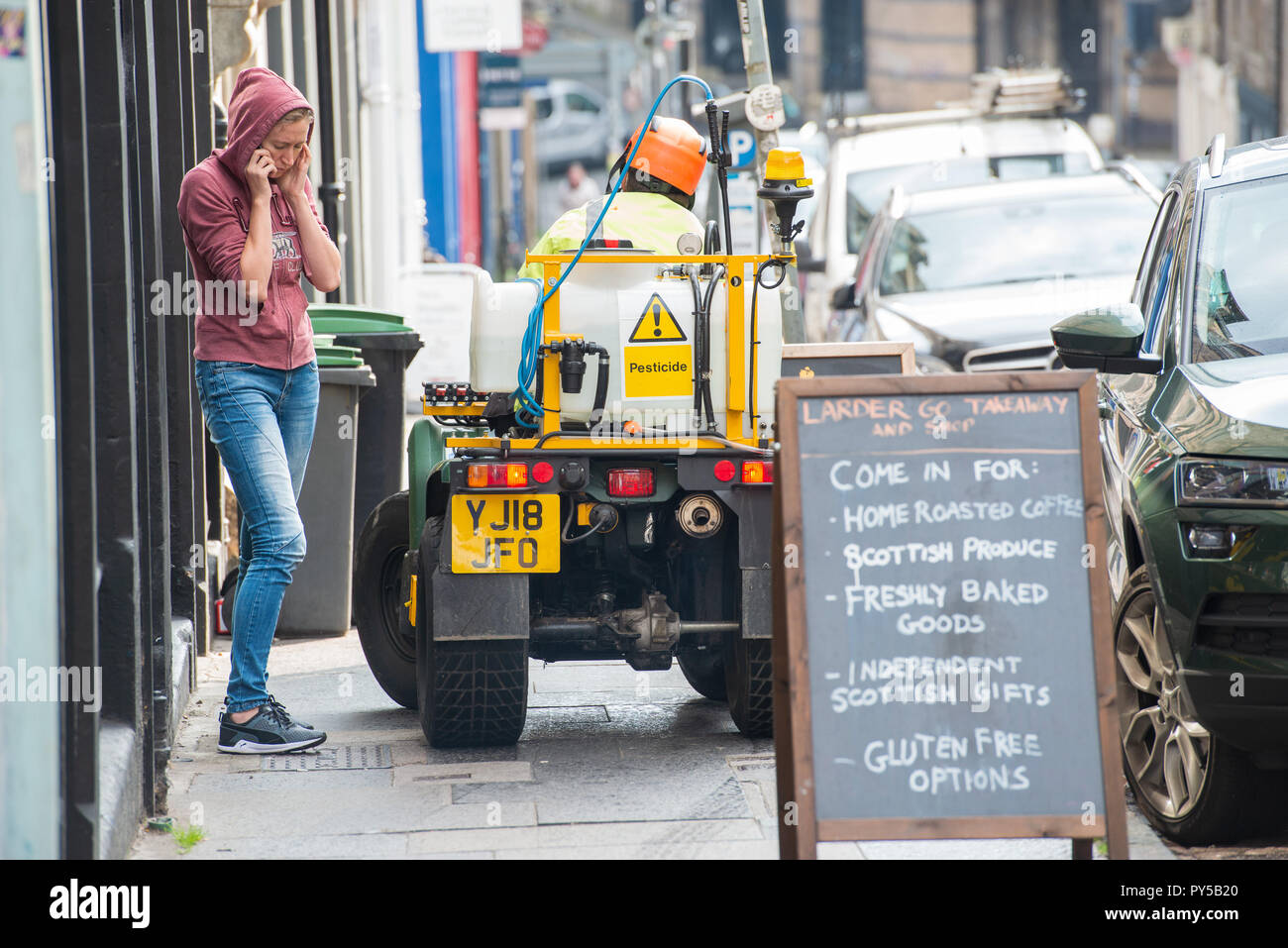 Weed spraying quad bike on Blackfriars street Stock Photo Alamy