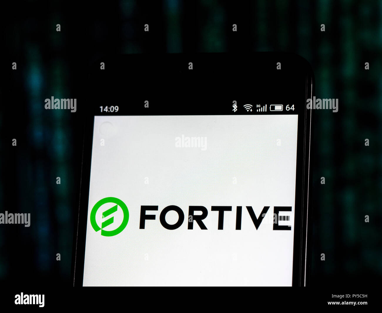 Fortive Industrial conglomerate company logo seen displayed on smart phone. Fortive is a diversified industrial conglomerate company. Stock Photo