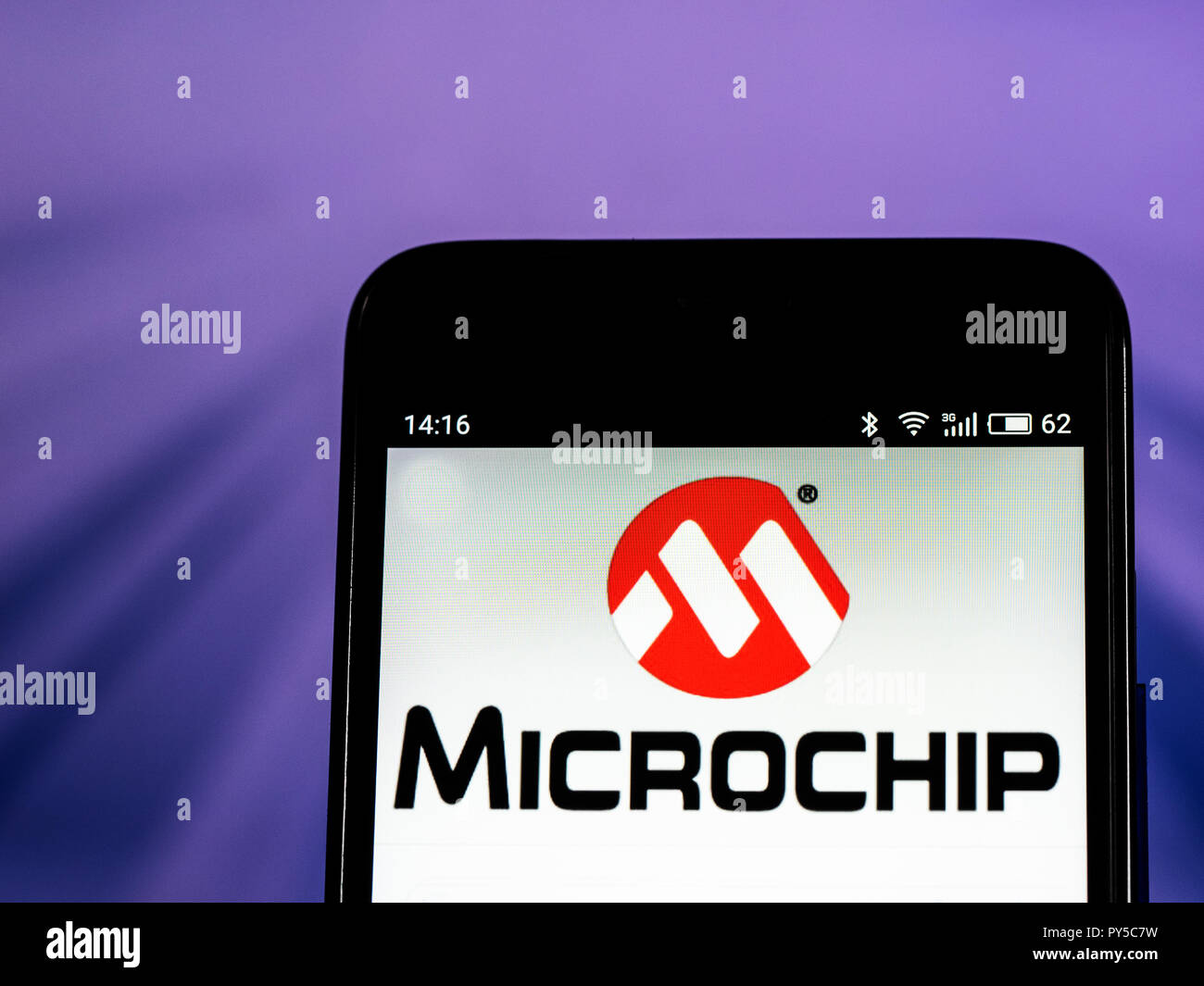 Microchip Technology Corporation logo seen displayed on smart phone. Microchip Technology Inc. is an American publicly-listed corporation that is a manufacturer of microcontroller, mixed-signal, analog and Flash-IP integrated circuits. Stock Photo