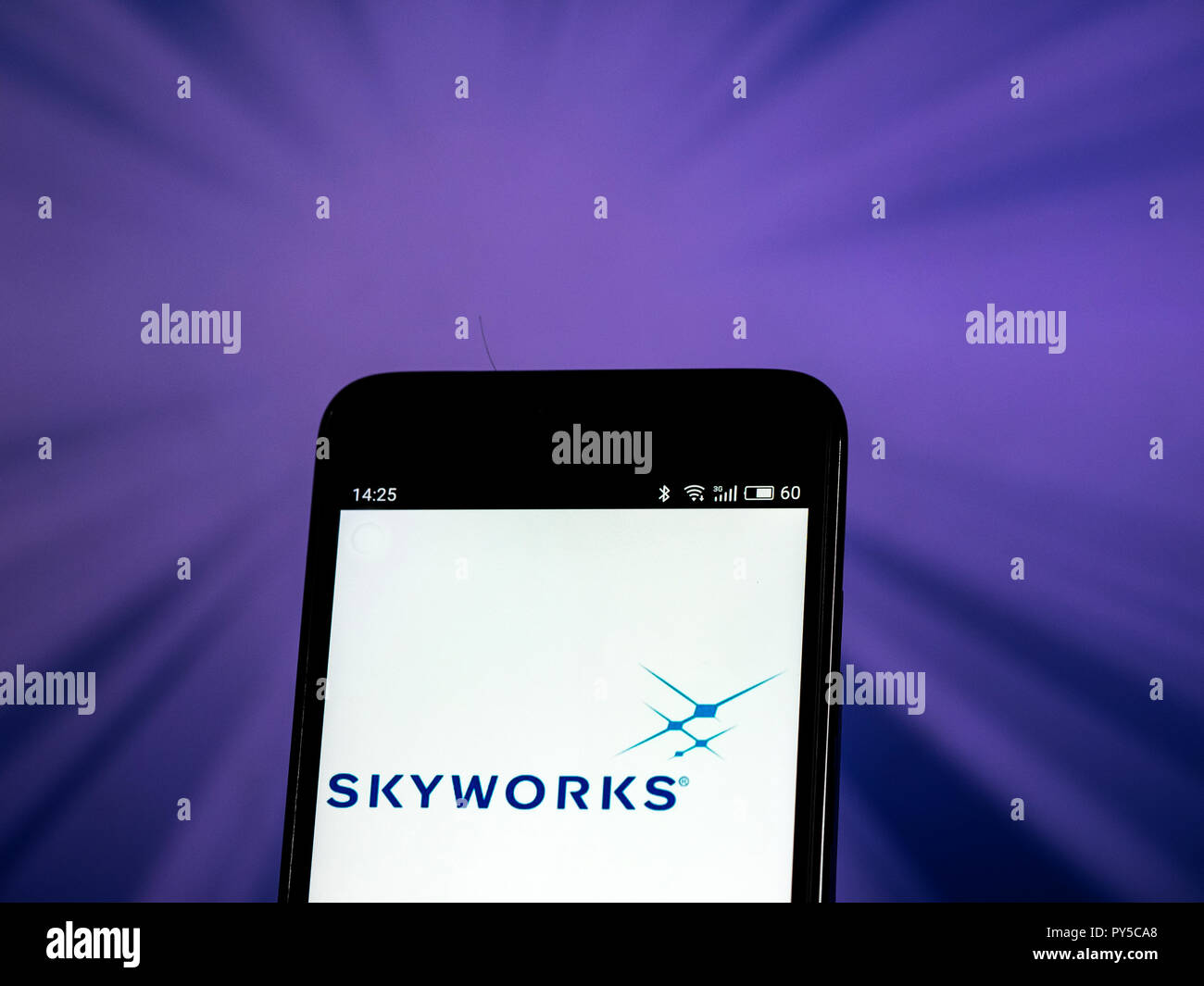 Skyworks Solutions Semiconductor manufacturing company logo seen displayed on smart phone. Skyworks manufactures semiconductors for use in radio frequency and mobile communications systems. Stock Photo