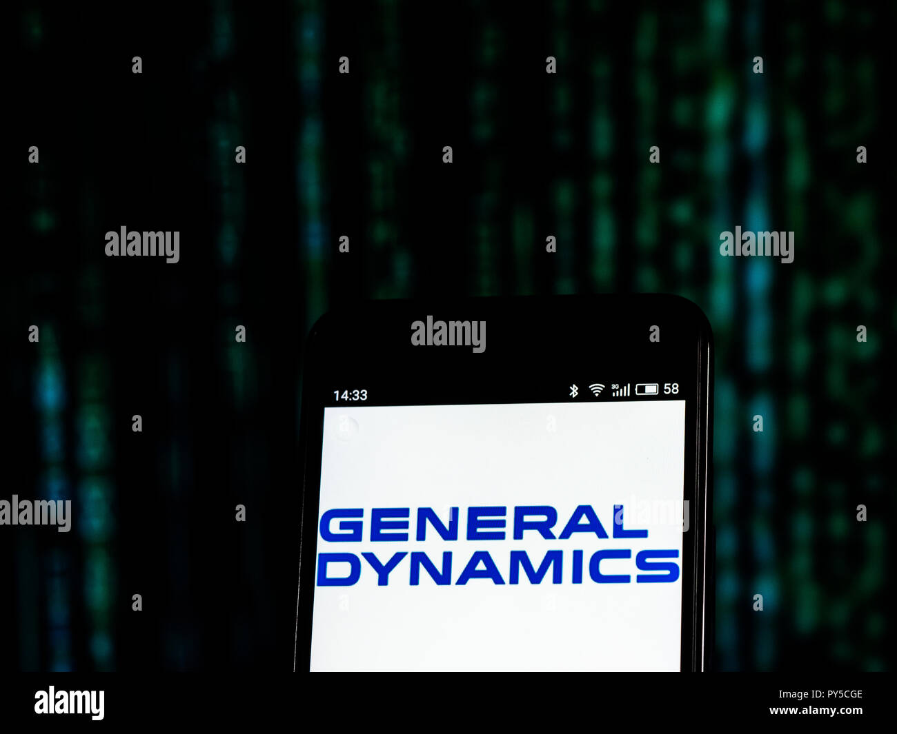 General Dynamics Aerospace and defense company logo seen displayed on smart phone. General Dynamics Corporation is an American corporation formed by mergers and divestitures. It is the world's fifth-largest defense contractor based on 2012 revenues. Stock Photo