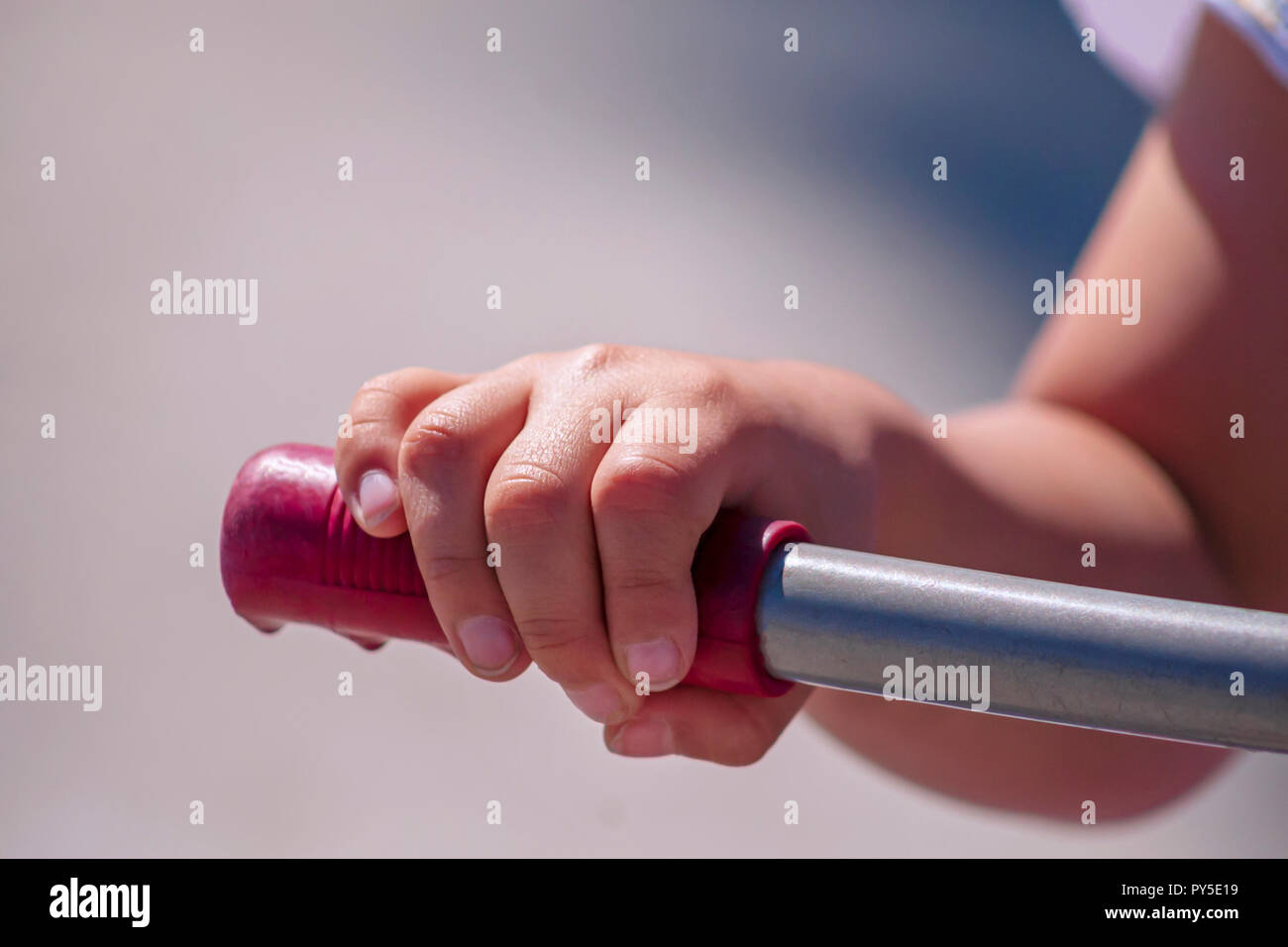 Closeup of a kid's hand ridding a bike Stock Photo - Alamy