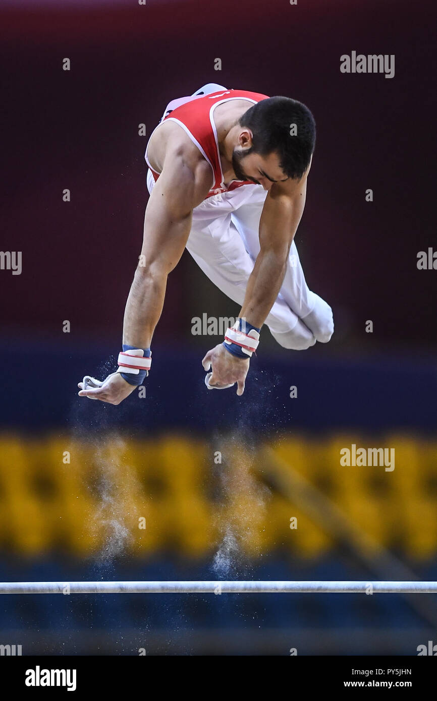 Doha, Qatar. 25th Oct, 2018. OLIVER HEGI from the Switzerland competes on the high bar during the first day of preliminary competition held at the Aspire Dome in Doha, Qatar. Credit: Amy Sanderson/ZUMA Wire/Alamy Live News Stock Photo