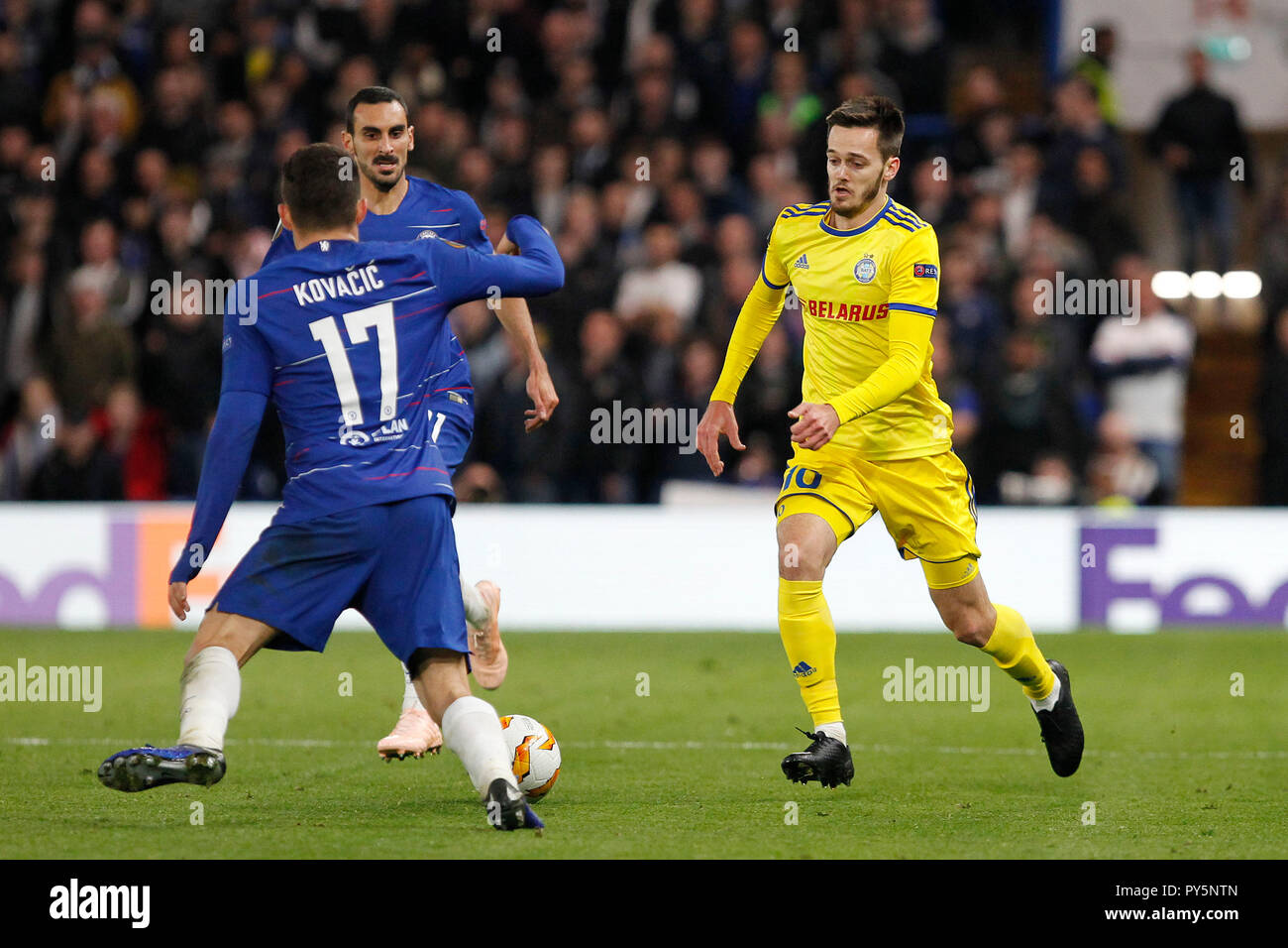 London, UK. 25th Oct 2018. Mirko Ivanic of BATE Borisov and Mateo Kovačić  of Chelsea contest a ball during the UEFA Europa League group stage match  between Chelsea and FC BATE Borisov
