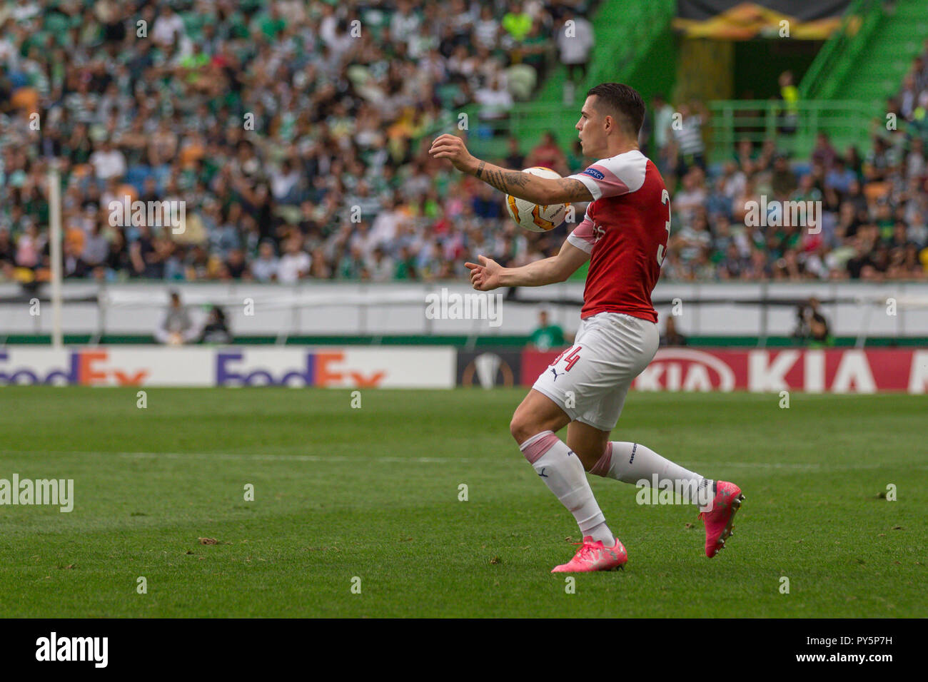 Lisbon, Portugal. October 25, 2018. Lisbon, Portugal. Arsenal's midfielder from Switzerland Granit Xhaka (34)  in action during the game of the UEFA Europa League, Group E, Sporting CP vs Arsenal FC Credit: Alexandre Sousa/Alamy Live News Stock Photo