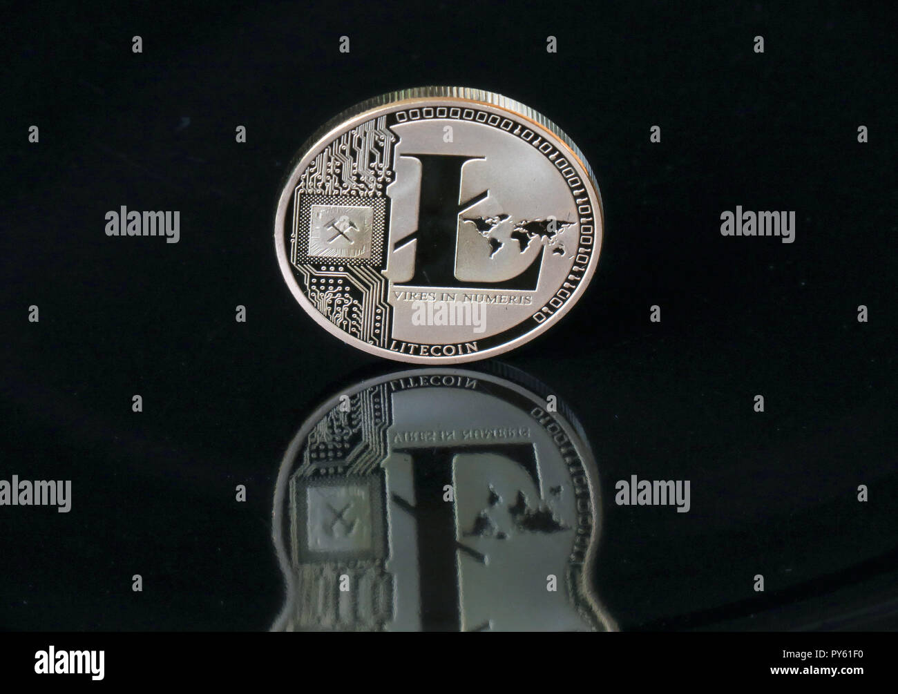 30 August 2018, Berlin: A Litecoin coin with the imprint 