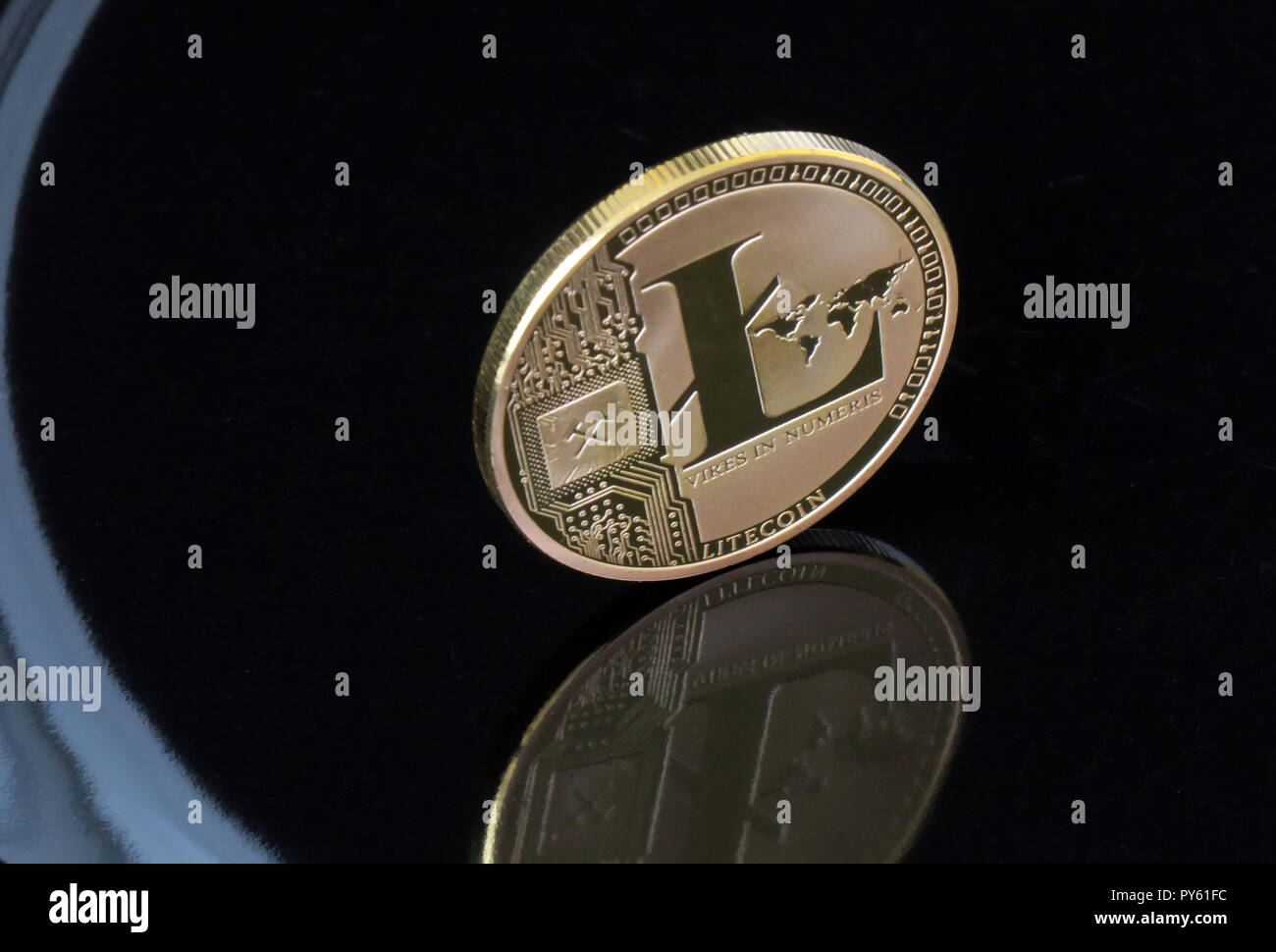 30 August 2018, Berlin: A Litecoin coin with the imprint 