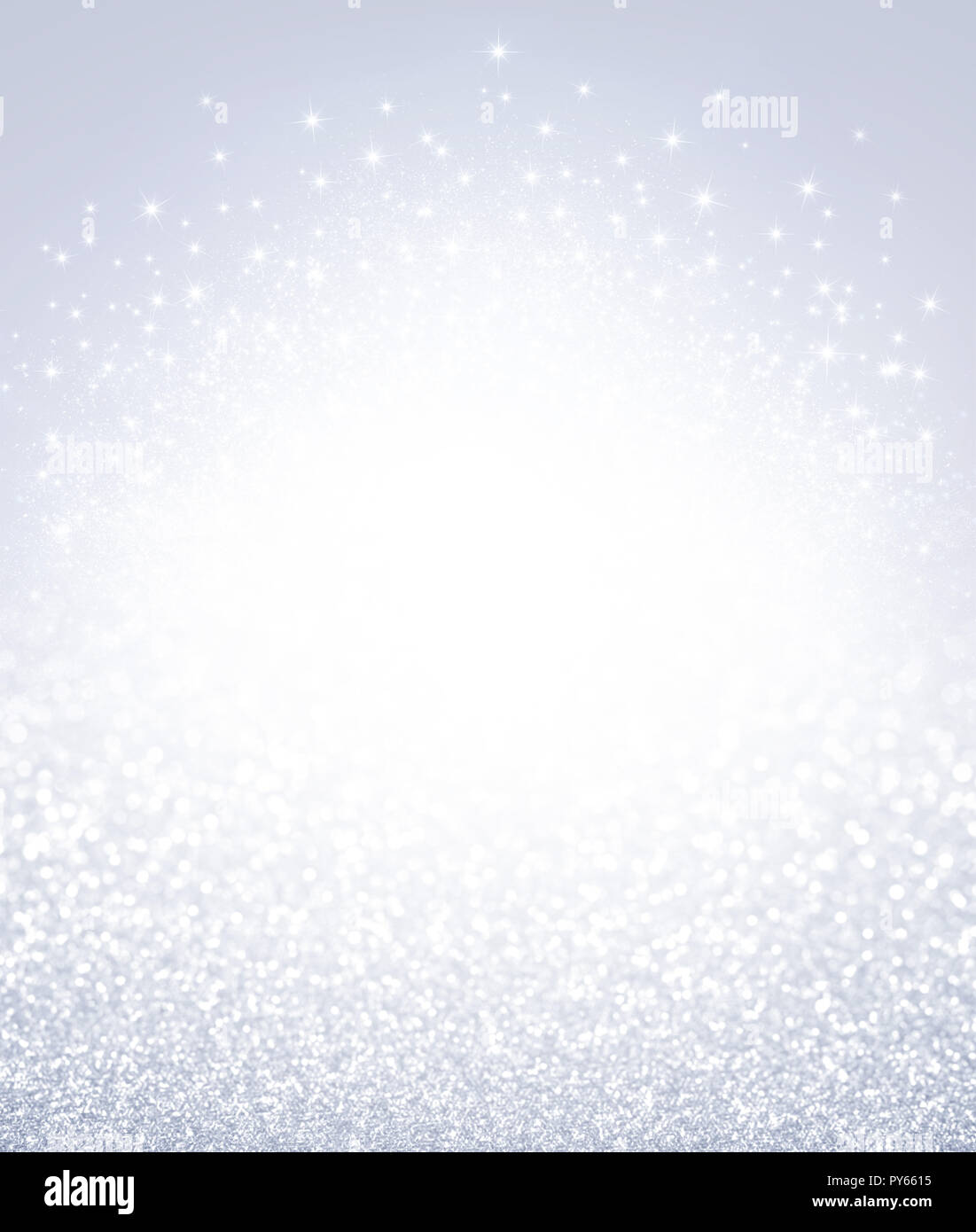 Glittering defocused silver background with shining stars exploding - Festive material Stock Photo