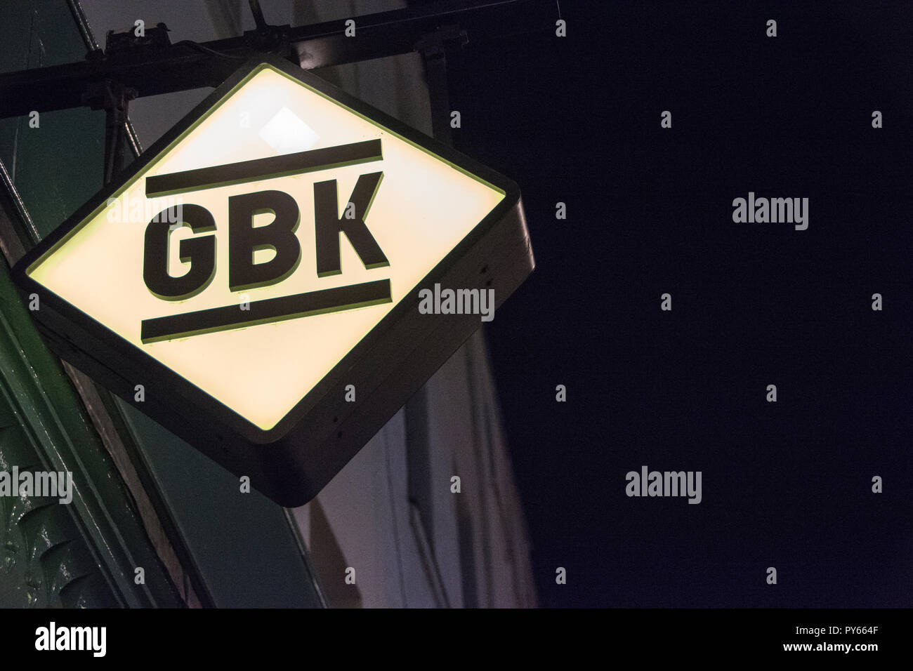 Closeup of signage outside struggling Gourmet Burger (GBK) chain restaurant in Soho, London, England, UK Stock Photo