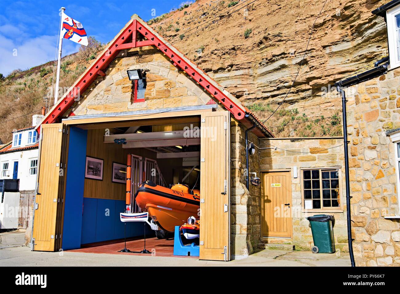 The Royal Life boat station at the foot of Penny Nabb, in the North Yorkshire fishing village, of Staithes. Stock Photo