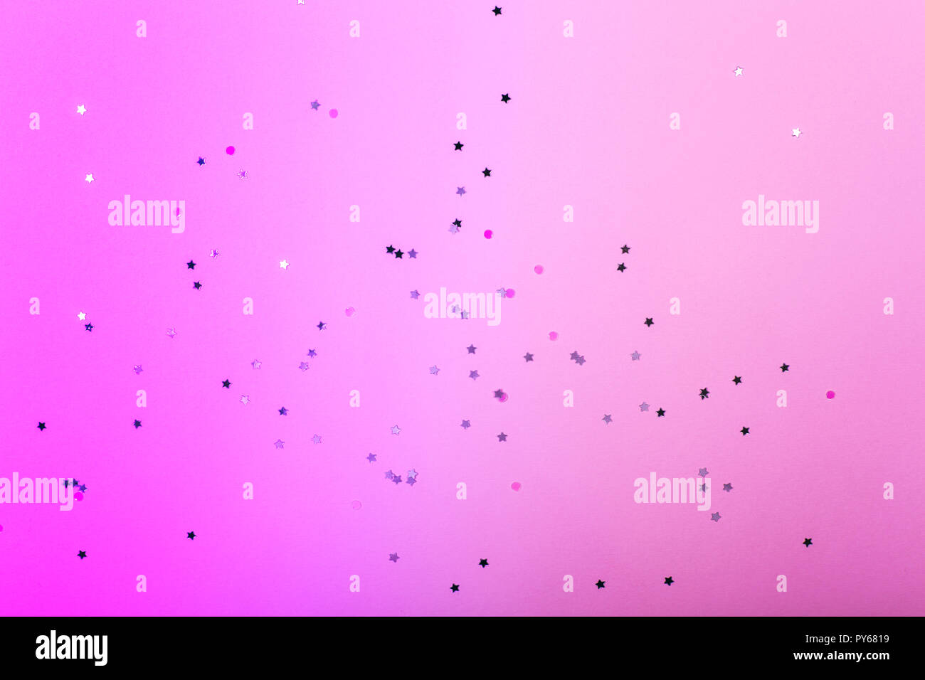 Bright Pink Background With Multicolored Sparkles On It Neon Gradient Festive Concept Stock Photo Alamy