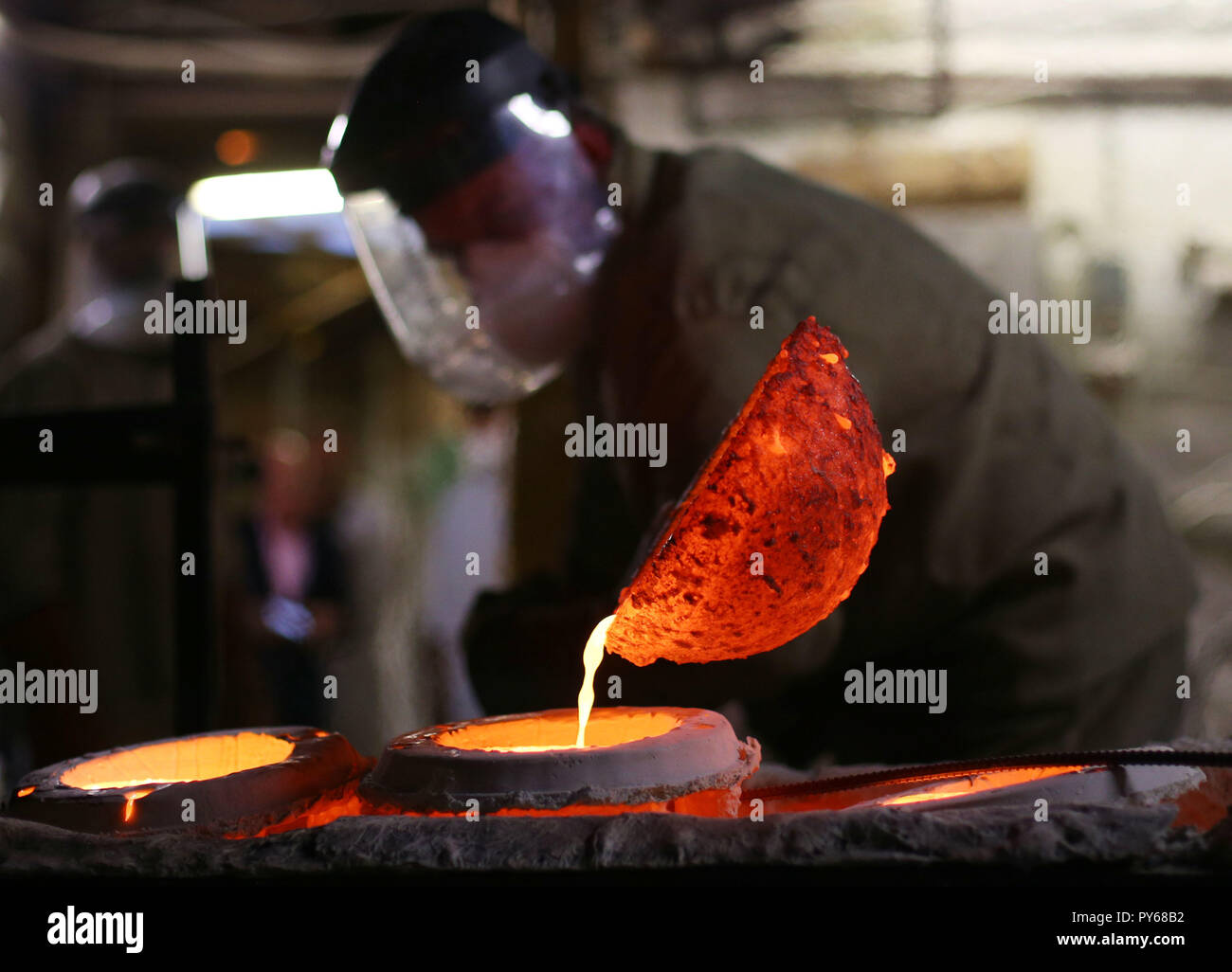 A foundry worker during the casting of Our Emmeline, a bronze statue of