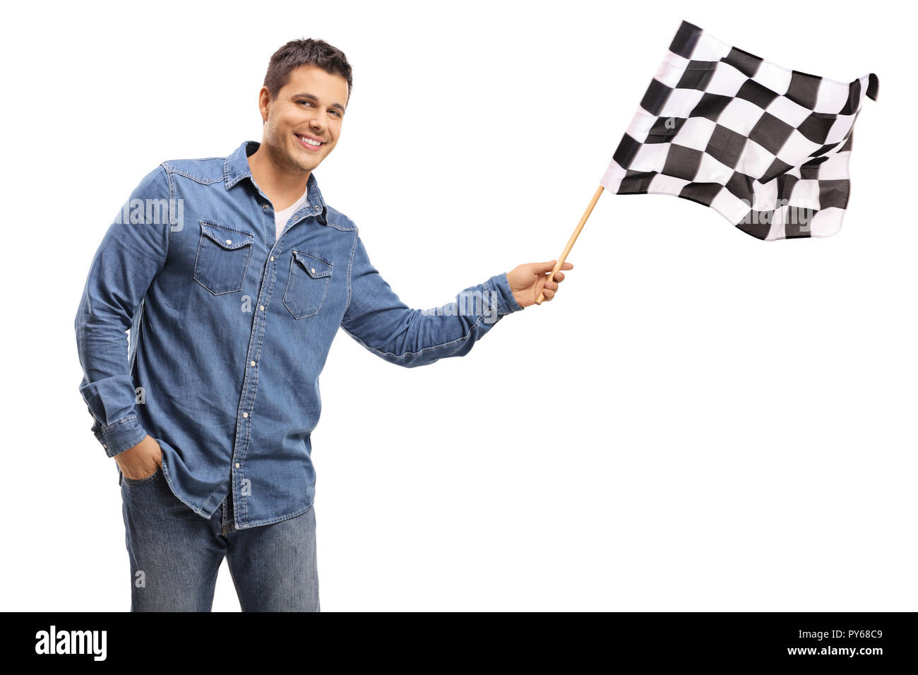 Young handsome man holding a checkered flag isolated on white background Stock Photo