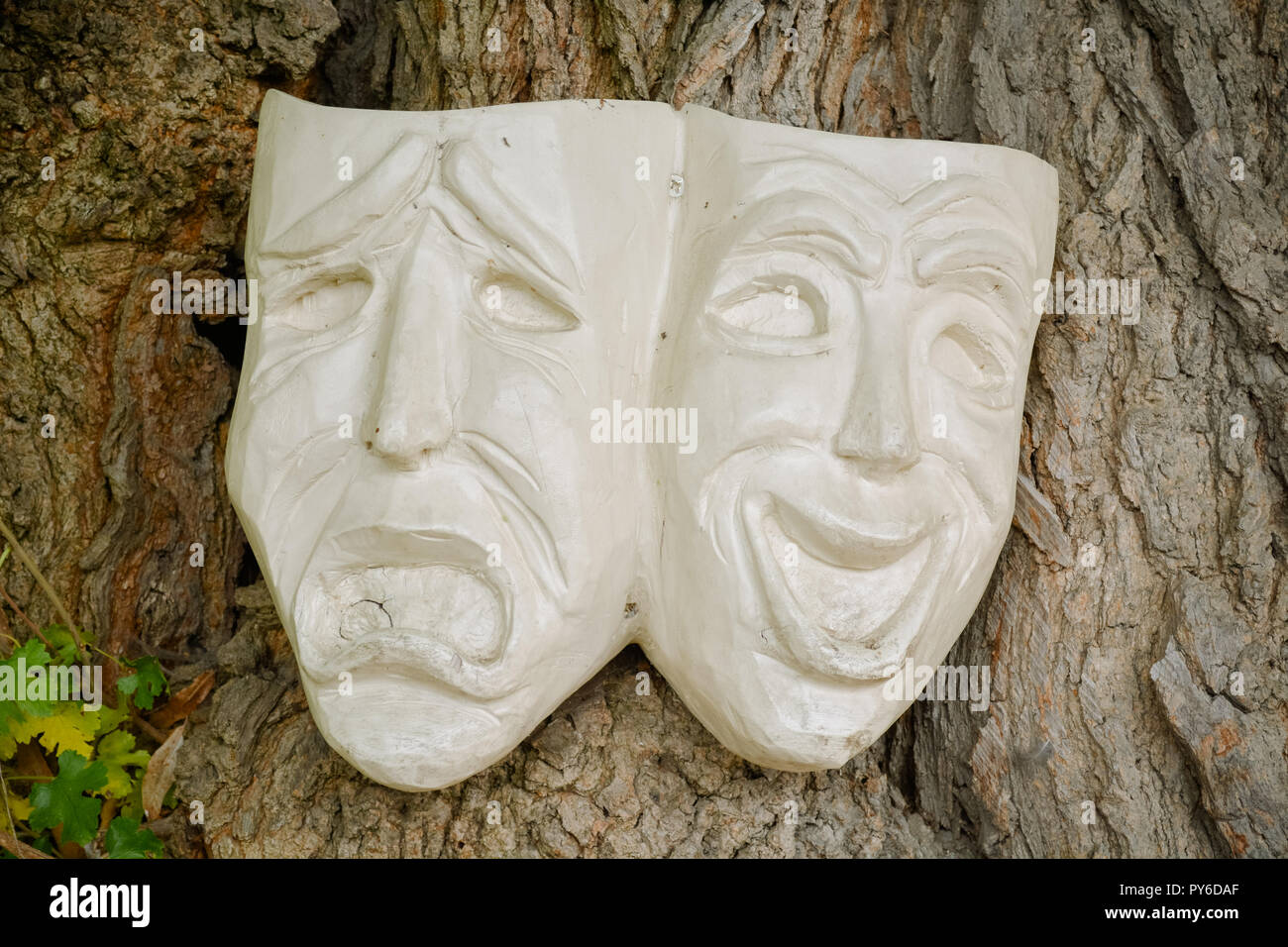 Theatre happy and sad wooden masks Stock Photo