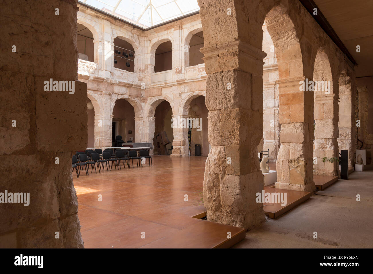 View through one of the arches of the courtyard of the Palace of the Dukes of Medinaceli in Medinaceli, Soria, Spain Stock Photo