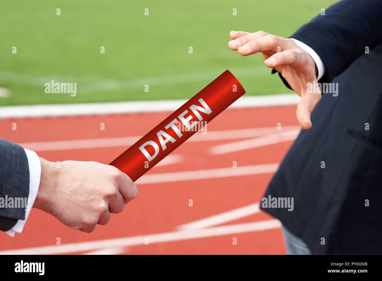 Businessman passing baton with German Word 'Daten' Stock Photo