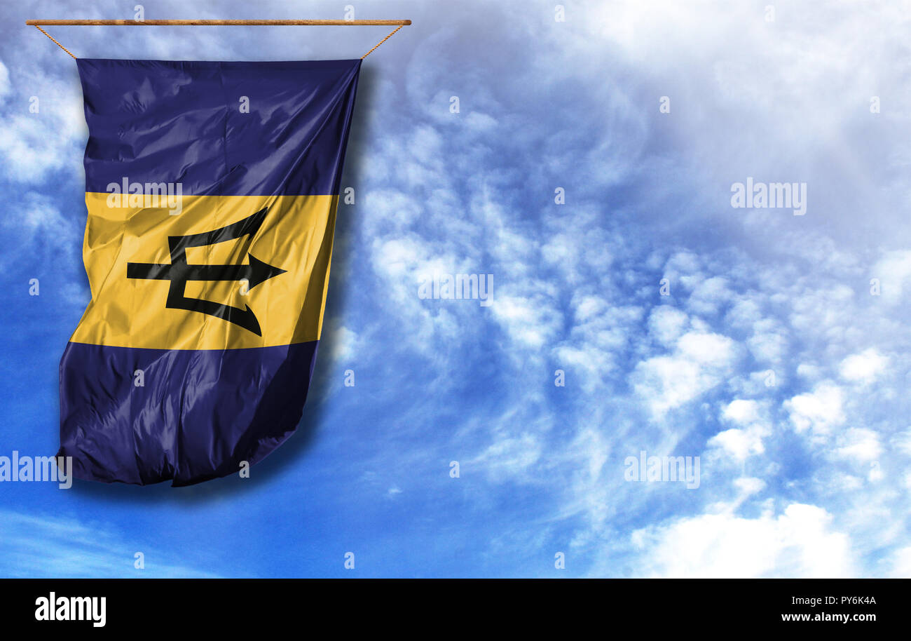 Flag of Barbados. Vertical flag, against blue sky with place for your text Stock Photo