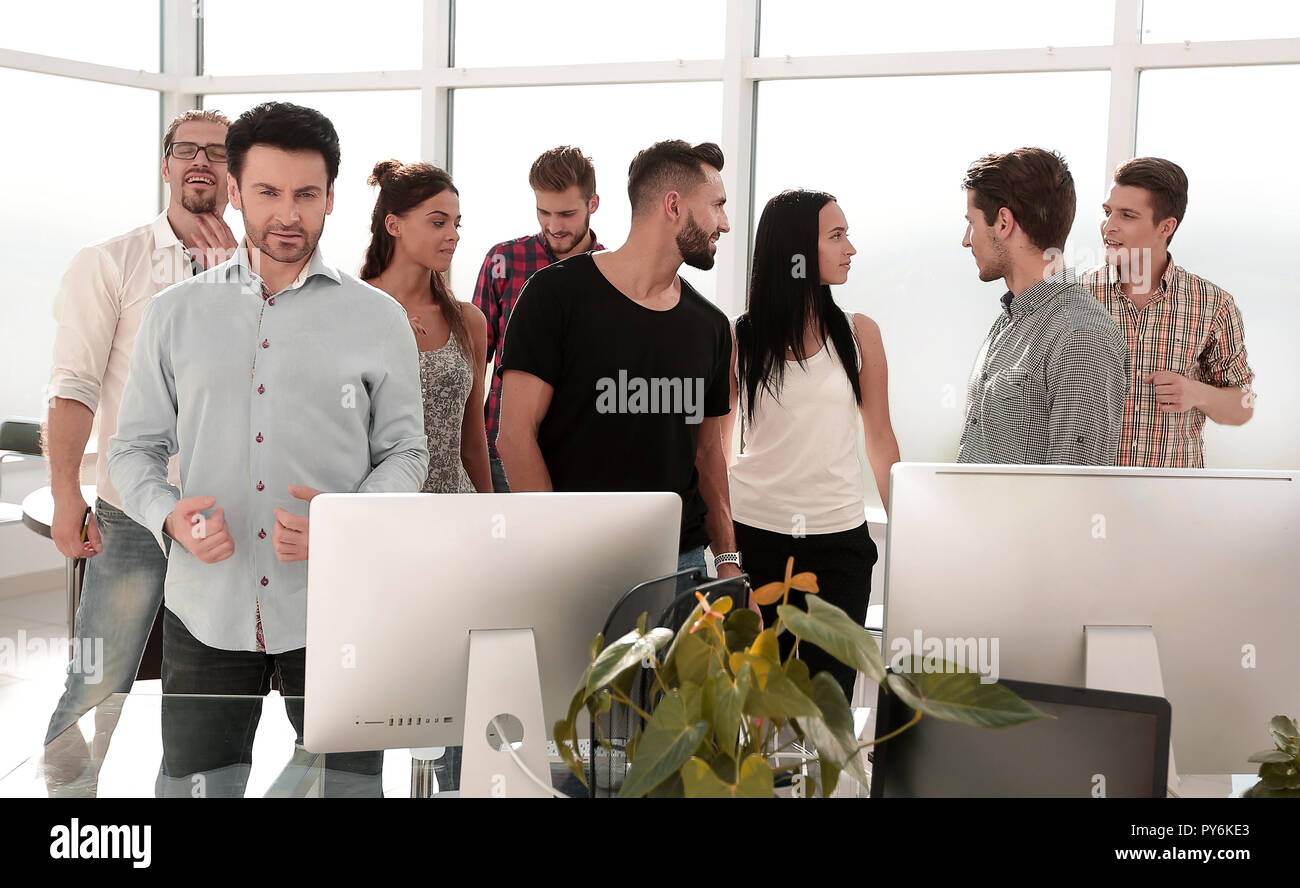 happy business team standing in modern office Stock Photo - Alamy