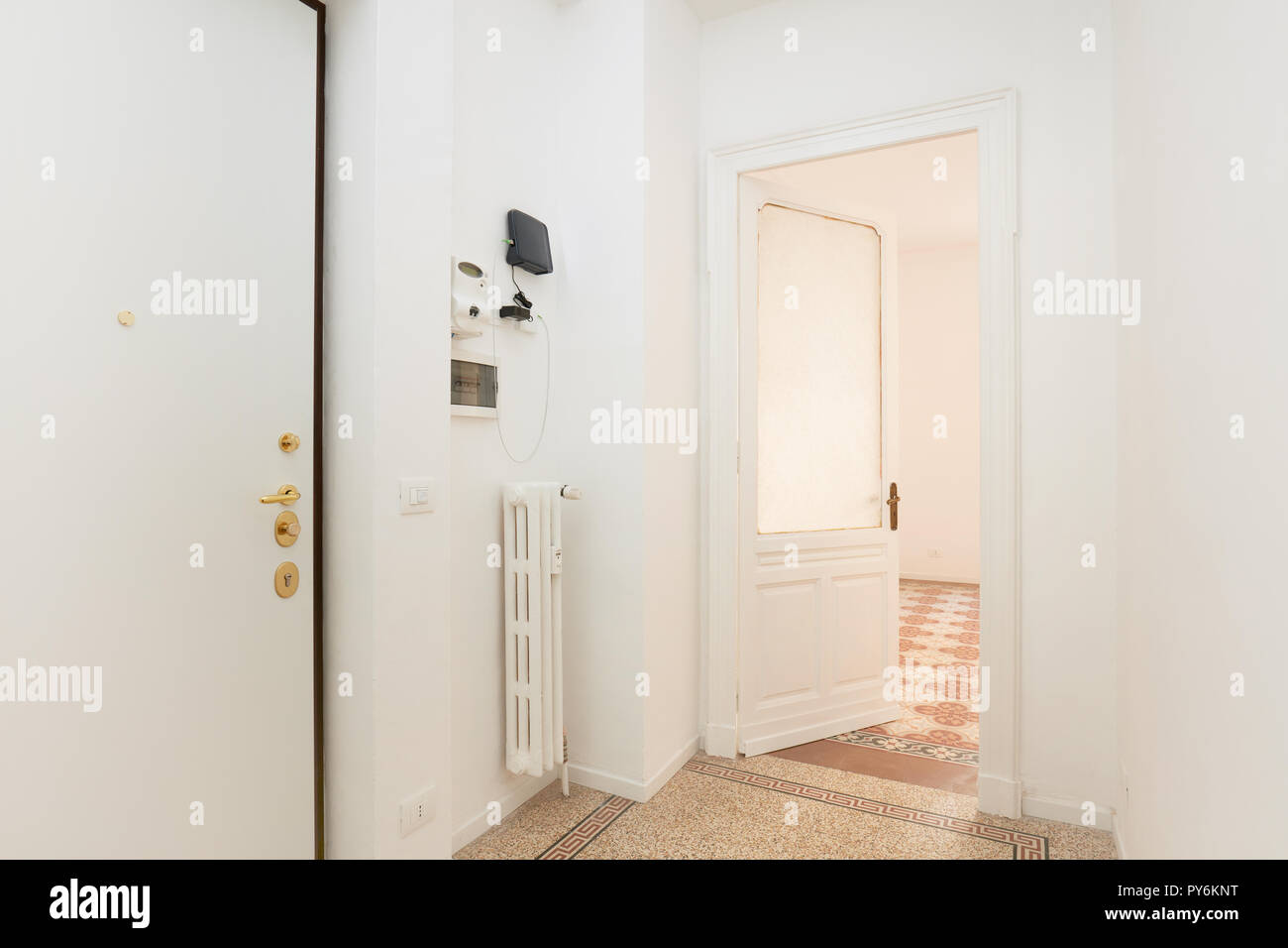 White, empty entrance in renovated apartment interior Stock Photo