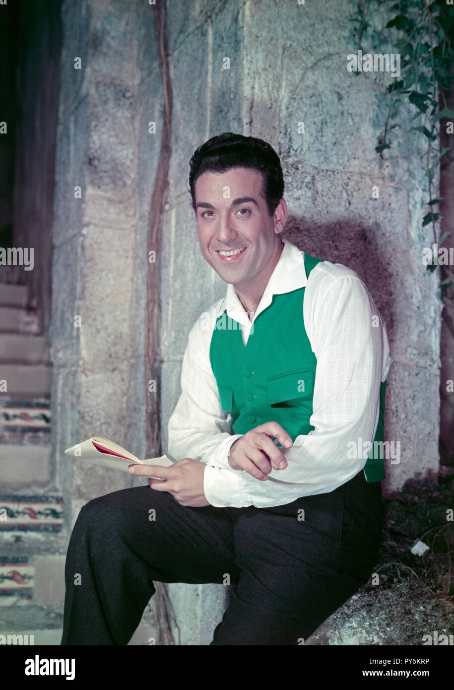 Mariano Eusebio González y García (13 August 1914 – 14 July 1970), also known as Luis Mariano, was a popular tenor of Spanish origin who achieved celebrity in 1946 with ' La belle de Cadix ' (' The Beautiful Lady of Cadix ') an operetta by Francis Lopez. He appeared in the 1954 film Adventures of the Barber of Seville and Le Chanteur de Mexico (1957) and became popular in France as well as his native Spain. Stock Photo