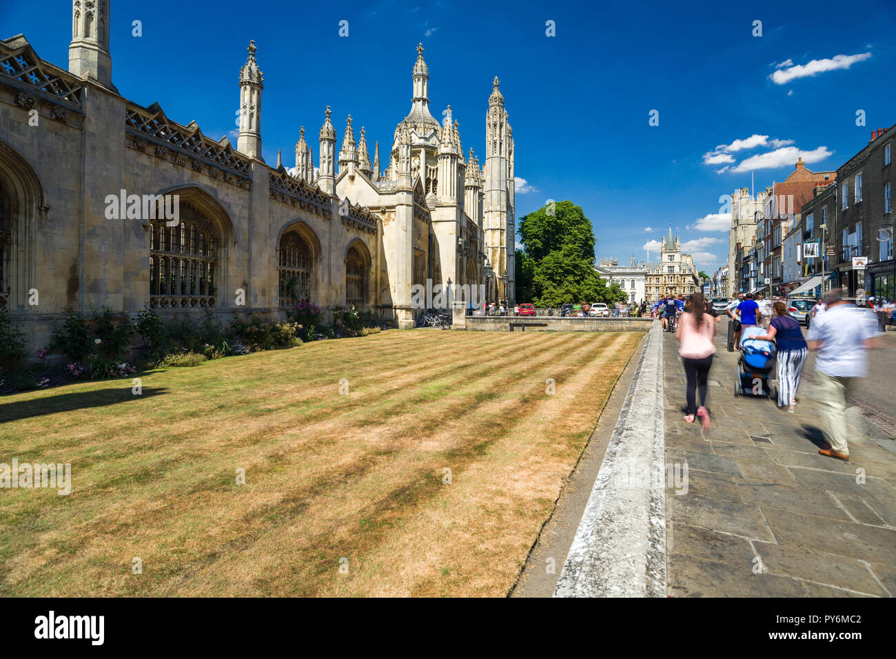 The exterior of Kings College with people outside on a sunny Summer afternoon, Cambridge, UK Stock Photo