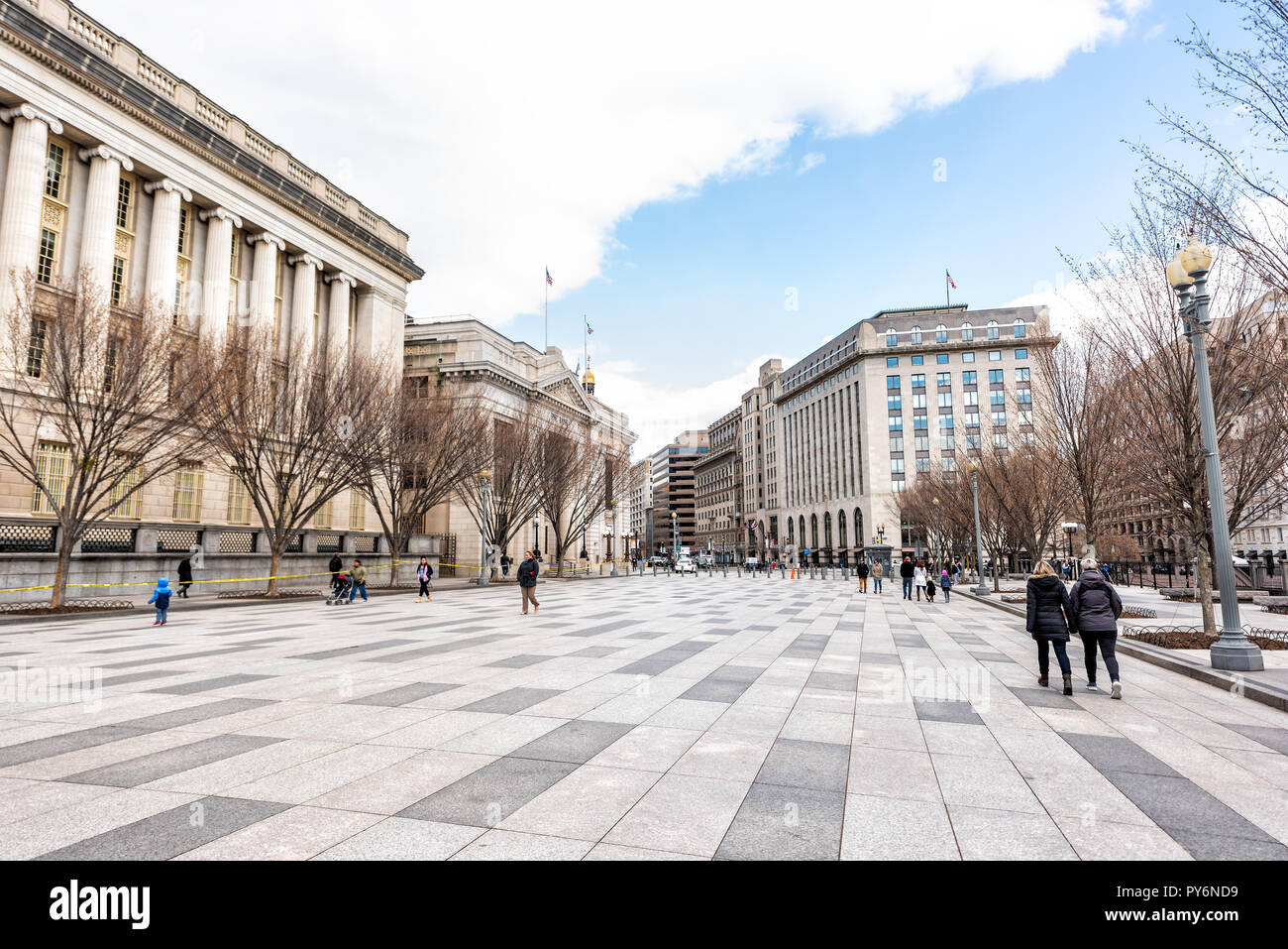 Washington DC, USA - March 9, 2018: Pennsylvania avenue during day in winter or spring, square with people, exterior architecture on national mall, De Stock Photo