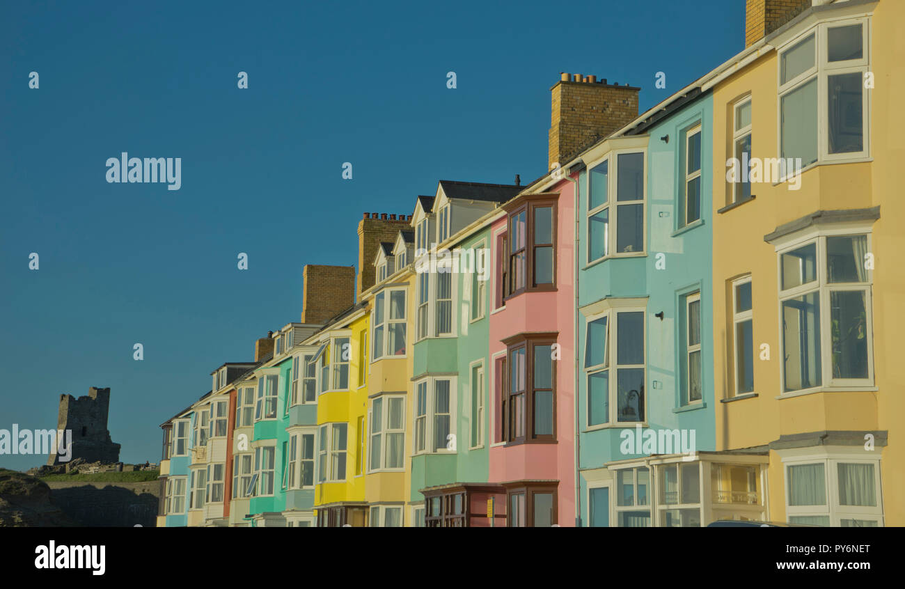 Houses in the south beach with castle in background in Aberystwyth