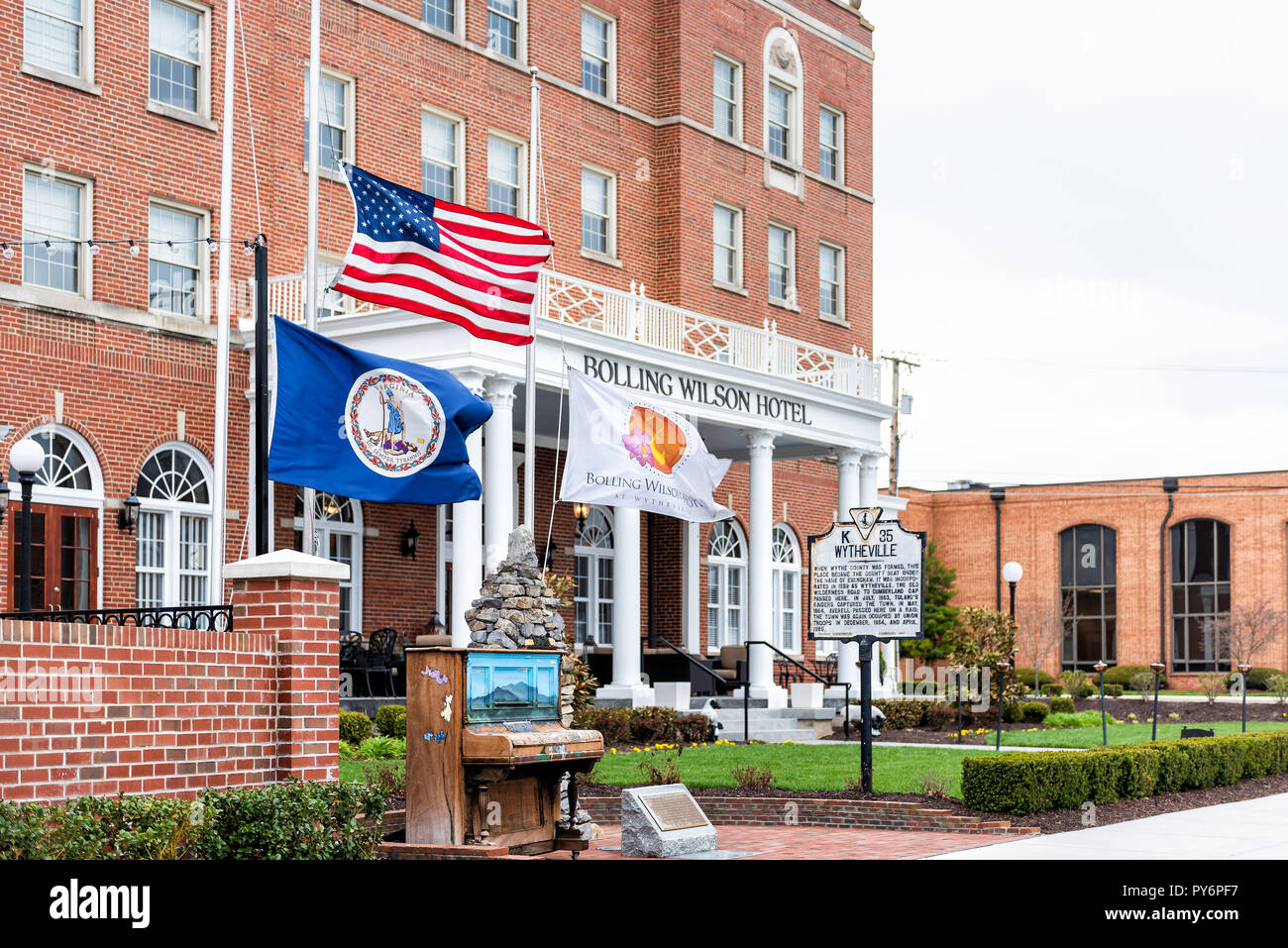 Wytheville, USA - April 19, 2018: Small town village signs flags for historic famous Bolling Wilson boutique hotel in southern south Virginia, histori Stock Photo