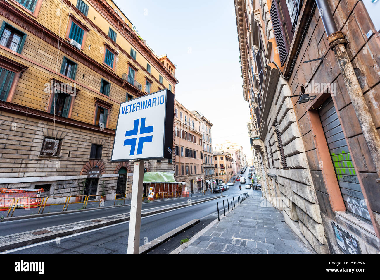 Rome, Italy - September 5, 2018: Italian street outside in city morning, wide angle empty road, nobody, closeup of Veterinarian veterinario sign, in M Stock Photo