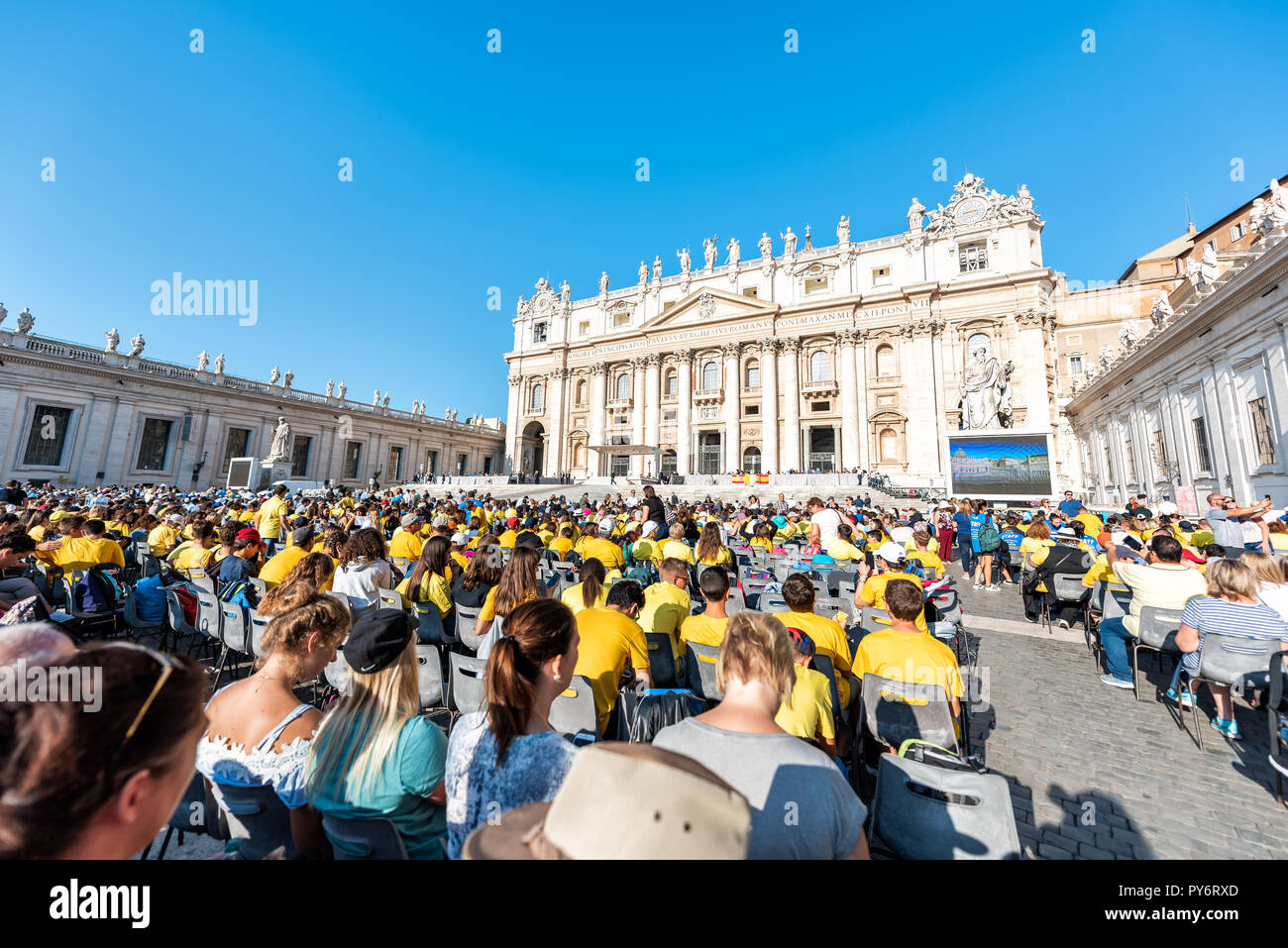 Vatican City, Italy - September 5, 2018: People sitting for church in