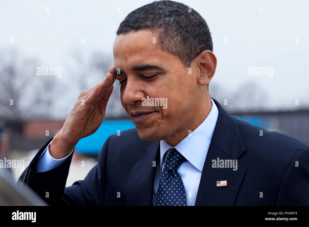 President Barack Obama salutes at Andrews Air Force Base before departing for Columbus, Ohio 3/6/09.  Official White House Photo by Pete Souza Stock Photo