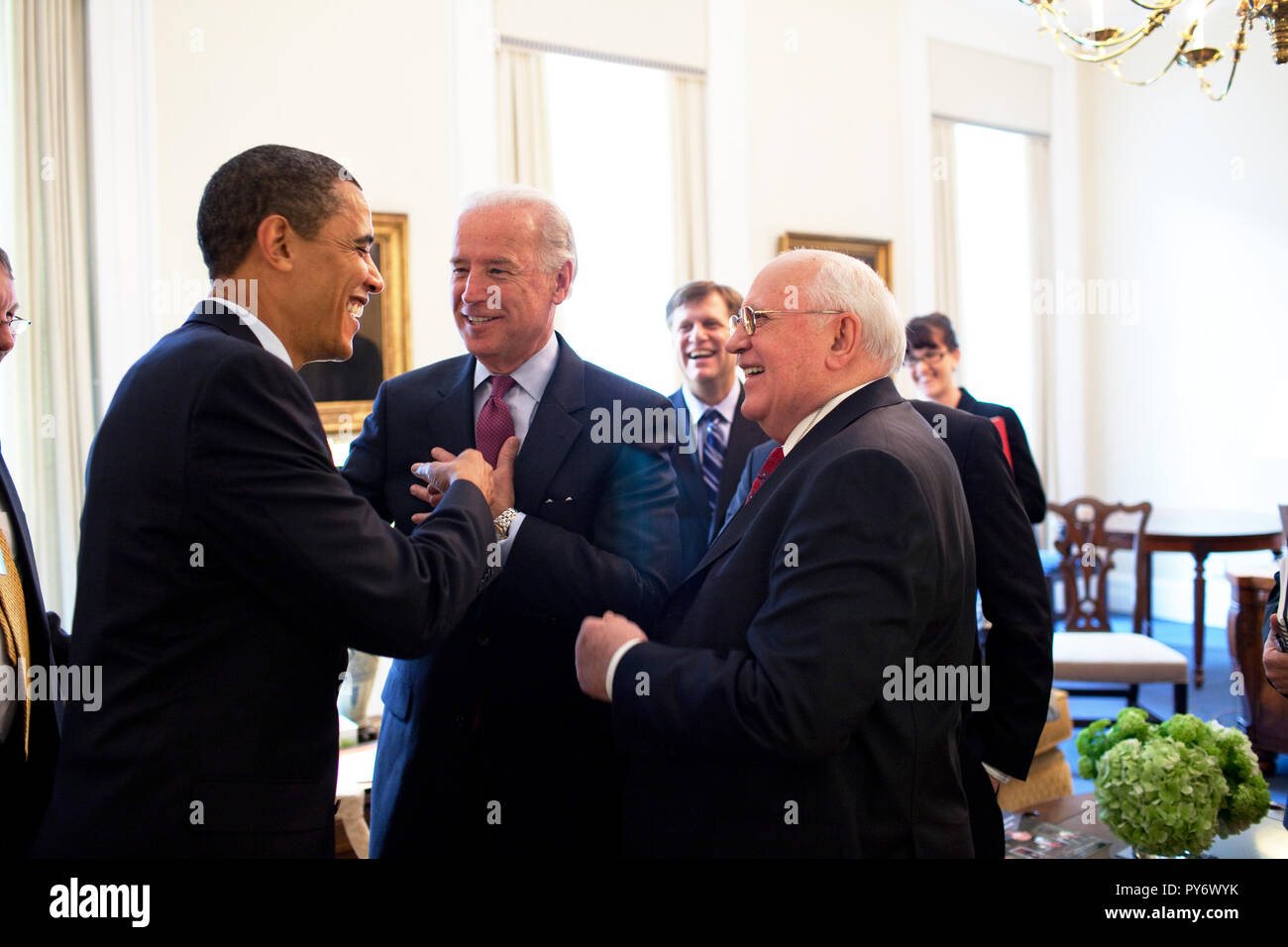 President Barack Obama drops by VP Joe Biden's meeting with former  Soviet Union President Mikhail Gorbachev in the Vice President's Office, West Wing 3/20/09.  Official White House Photo by Pete Souza Stock Photo