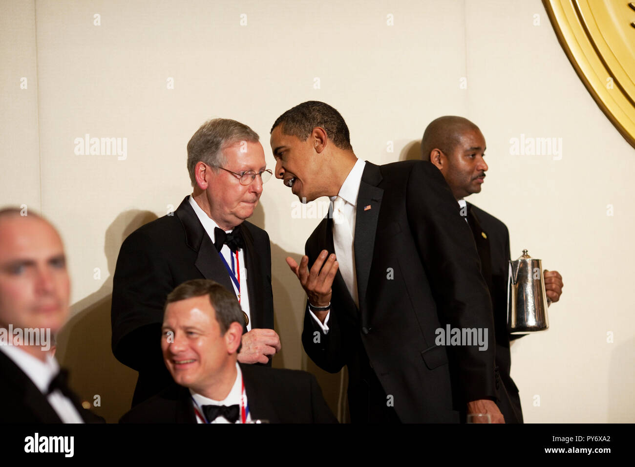 President Barack Obama speaks with Senate Minority Leader Mitch McConnell at the Annual Alfalfa Dinner at the Capital Hilton Hotel, Washington, D.C.  1/31/09  Official White House Photo by Pete Souza Stock Photo