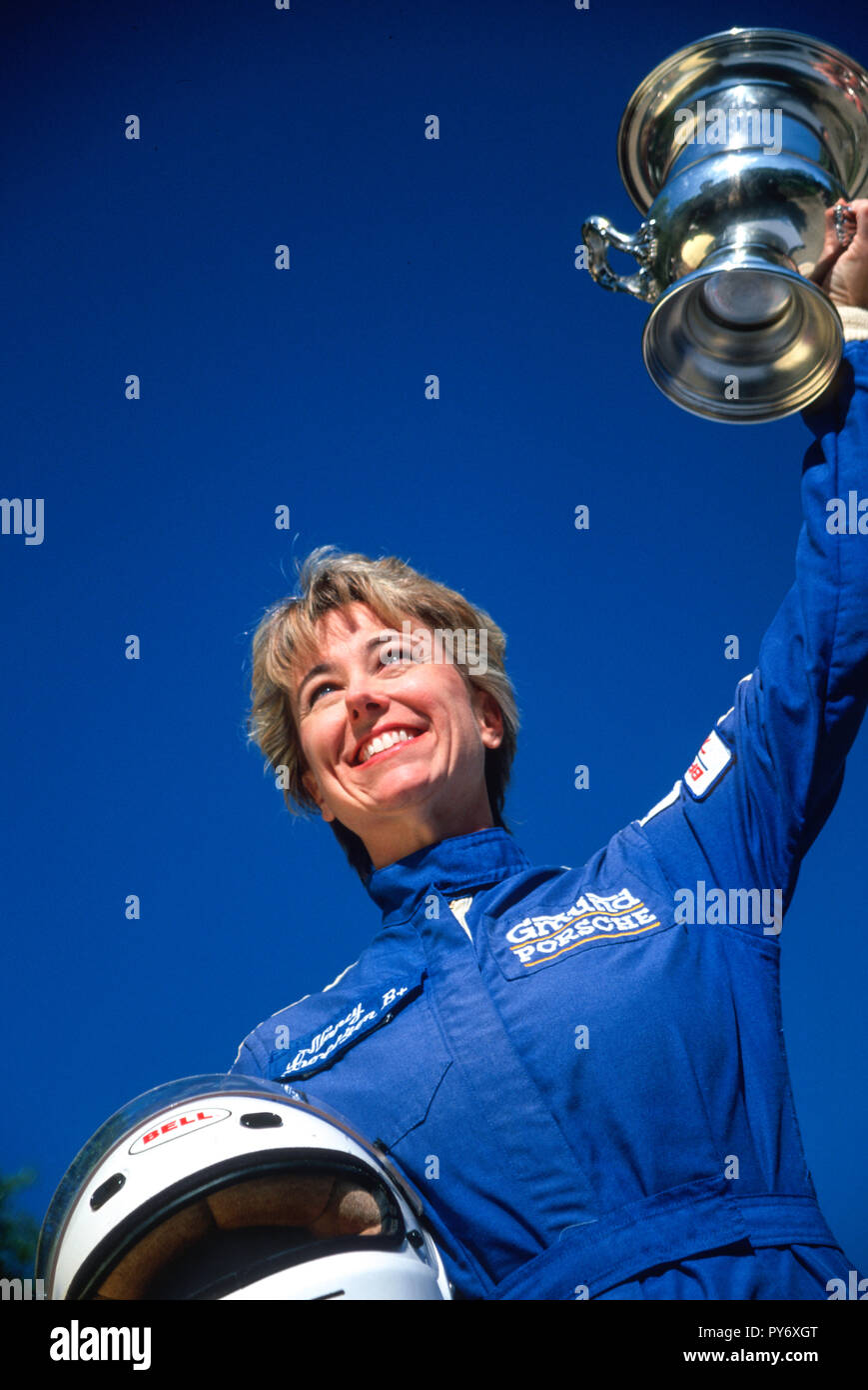 Racer with driving suit hires stock photography and images Alamy